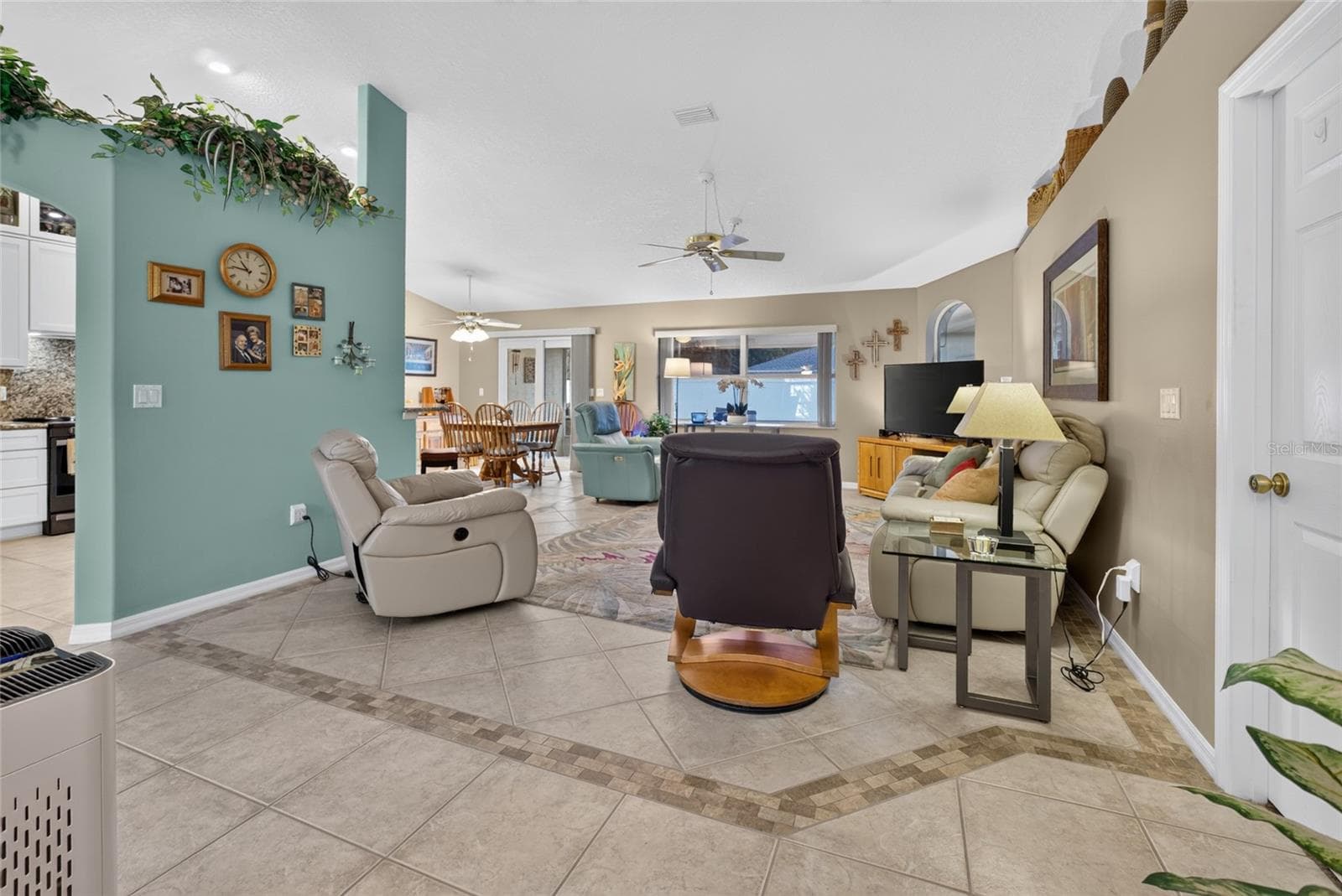 Open floor plan to living and dining rooms - 110 BURROUGHS DR, PALM COAST