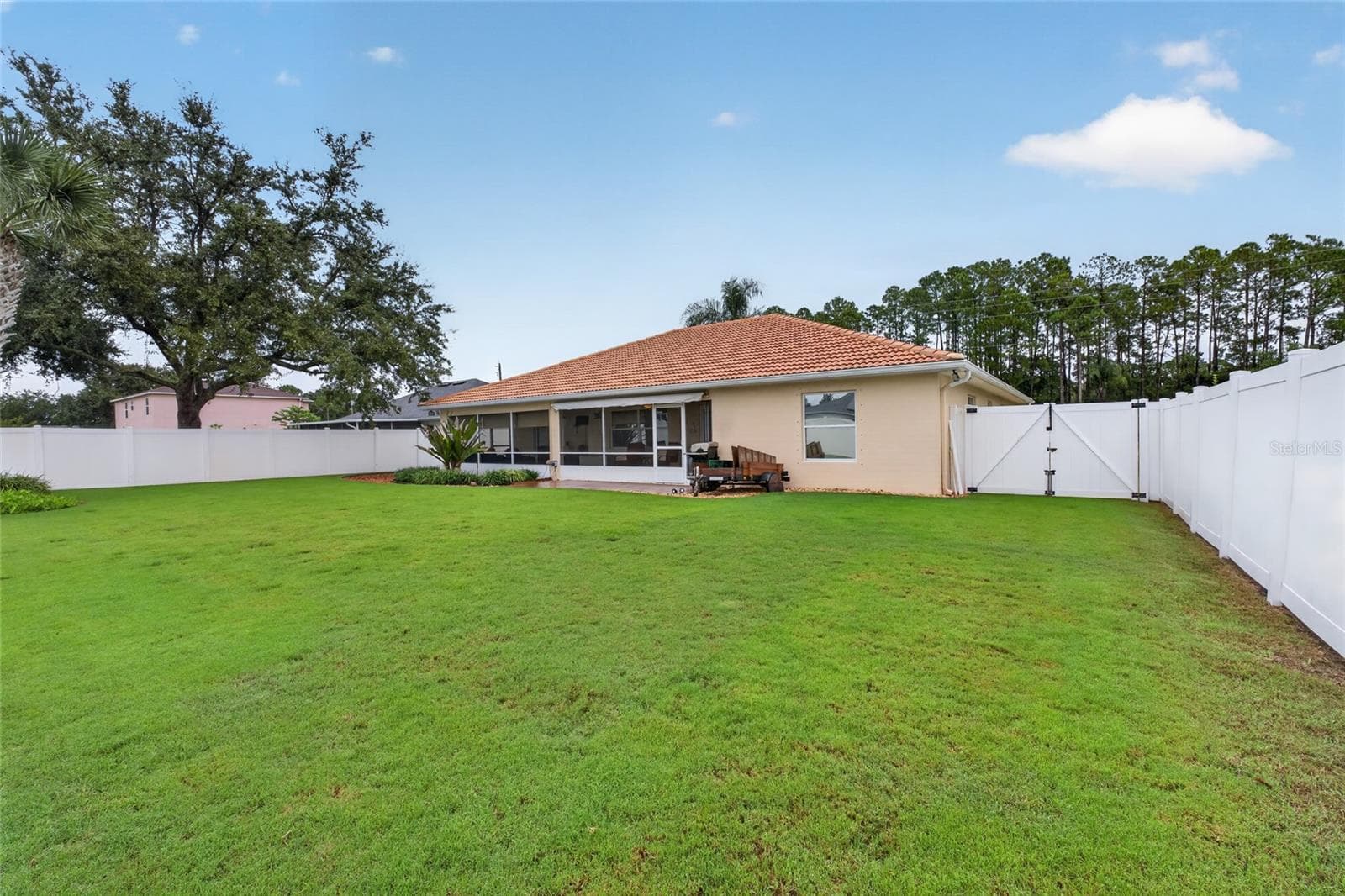 Totally fenced yard. - 110 BURROUGHS DR, PALM COAST