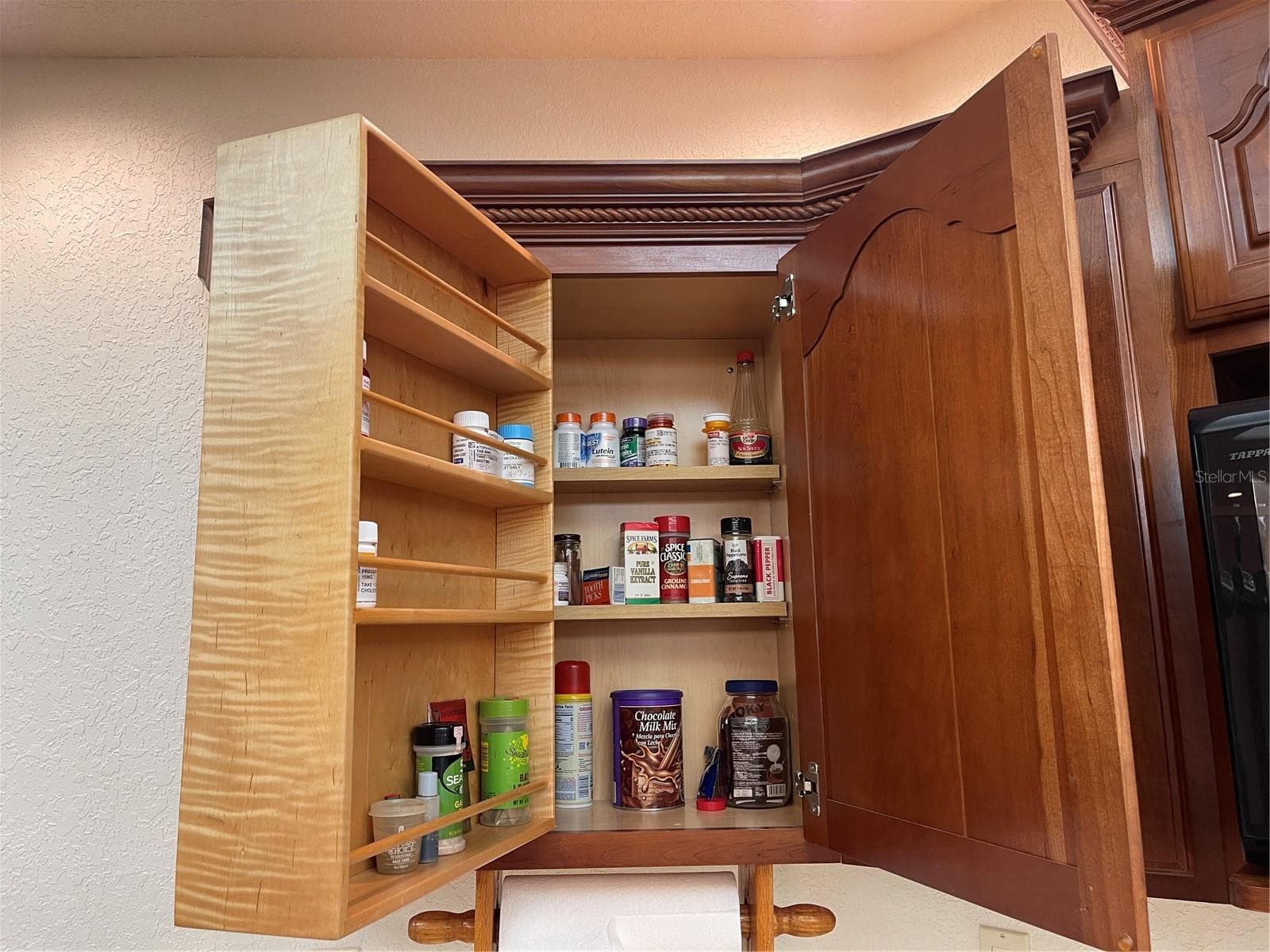 Hinged spice rack swivels open - 5422 CYRIL DR, DADE CITY
