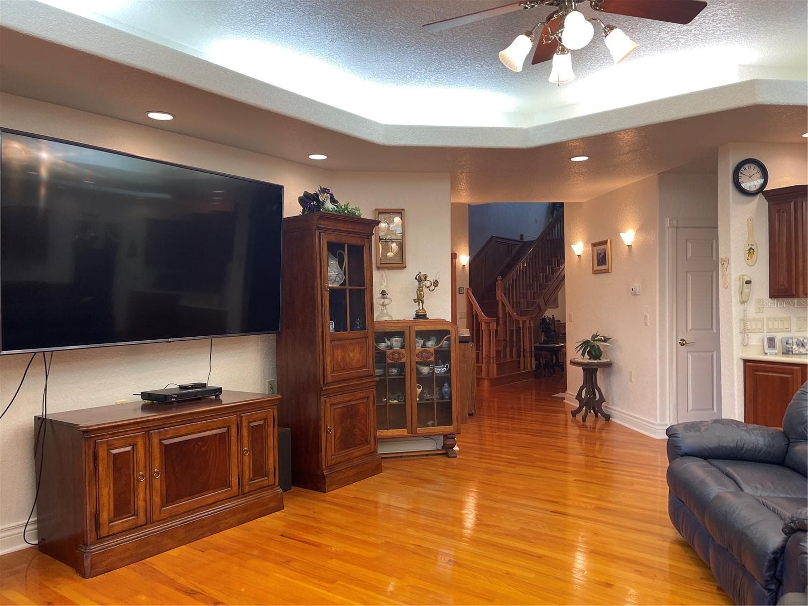 Beautiful 3/4 inch red oak wood planked flooring is the primary flooring in the home. - 5422 CYRIL DR, DADE CITY