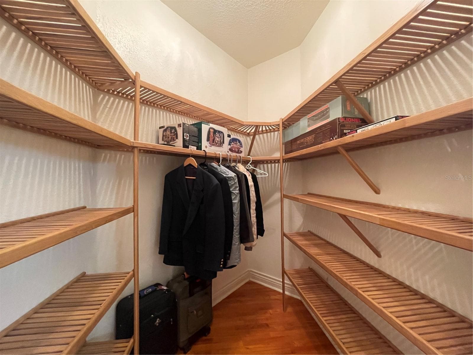One of two walk in closets in the primary bedroom - 5422 CYRIL DR, DADE CITY