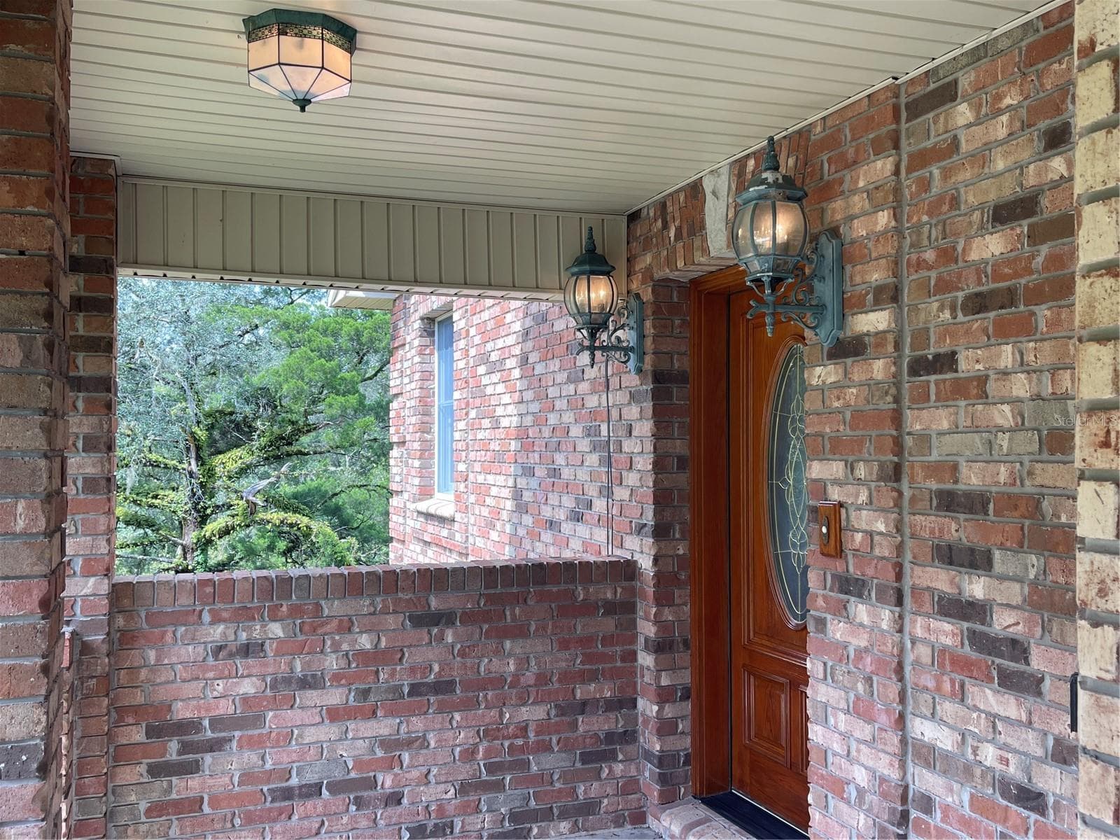 Door leads into the parlor on the second floor - 5422 CYRIL DR, DADE CITY
