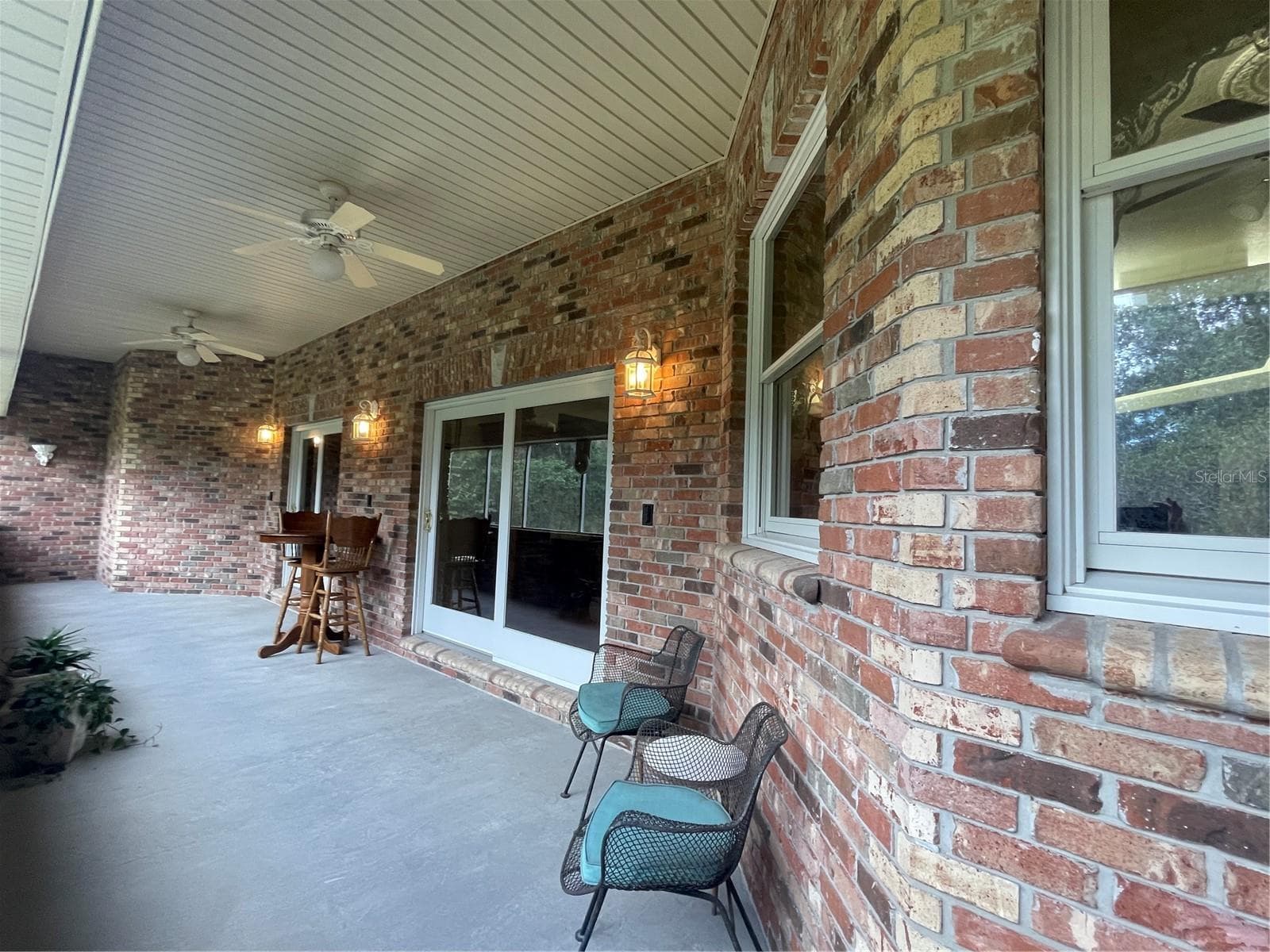 Screened Balcony facing the river is 324 sq ft - 5422 CYRIL DR, DADE CITY
