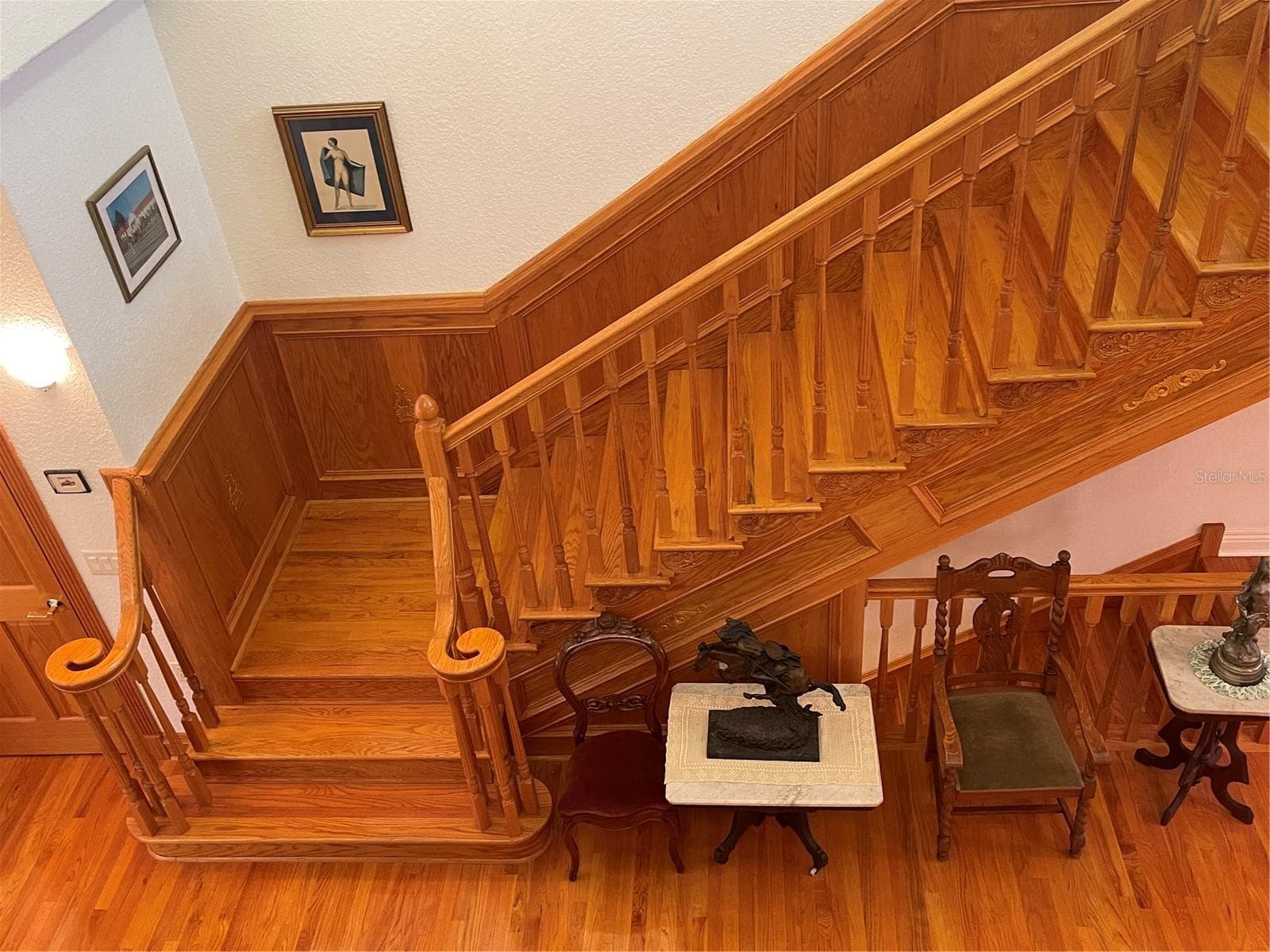 Spindles, volute and banister are all solid wood - 5422 CYRIL DR, DADE CITY