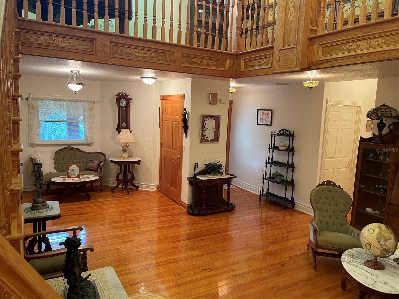 The door to the left is a closet, hall to the right leads to den and indoor utility rooms - 5422 CYRIL DR, DADE CITY