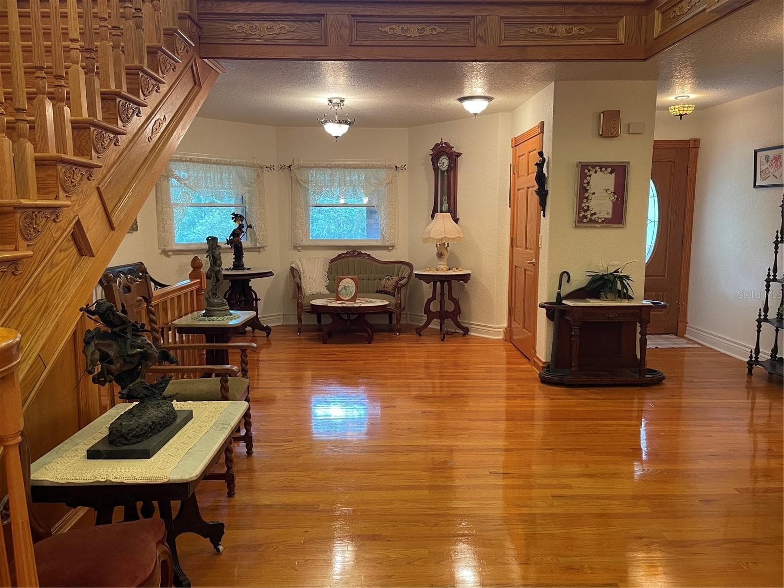 We call this the parlor on the second floor which is the central room referenced as a bonus room - 5422 CYRIL DR, DADE CITY