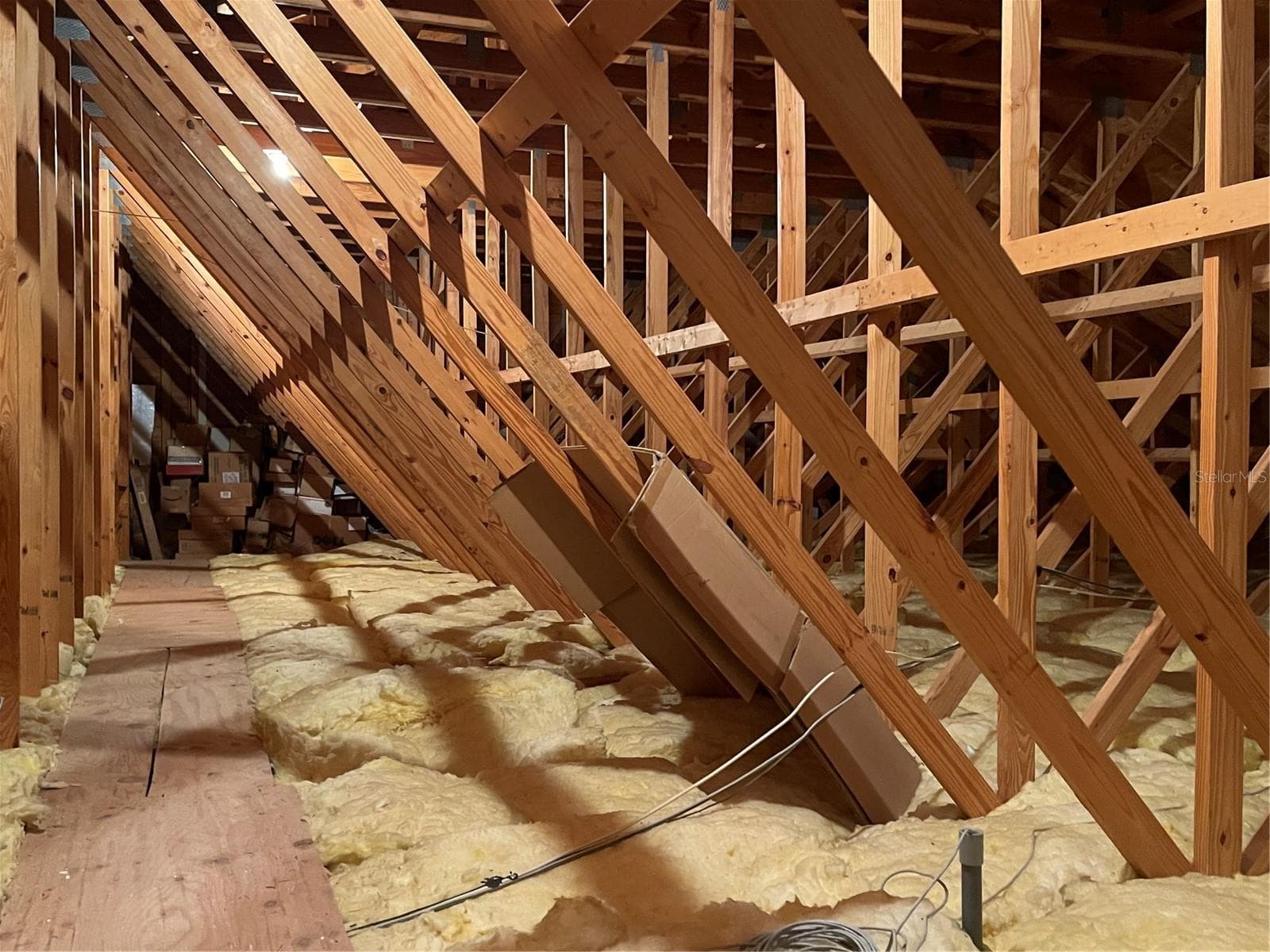 Attic has adequate lighting - 5422 CYRIL DR, DADE CITY