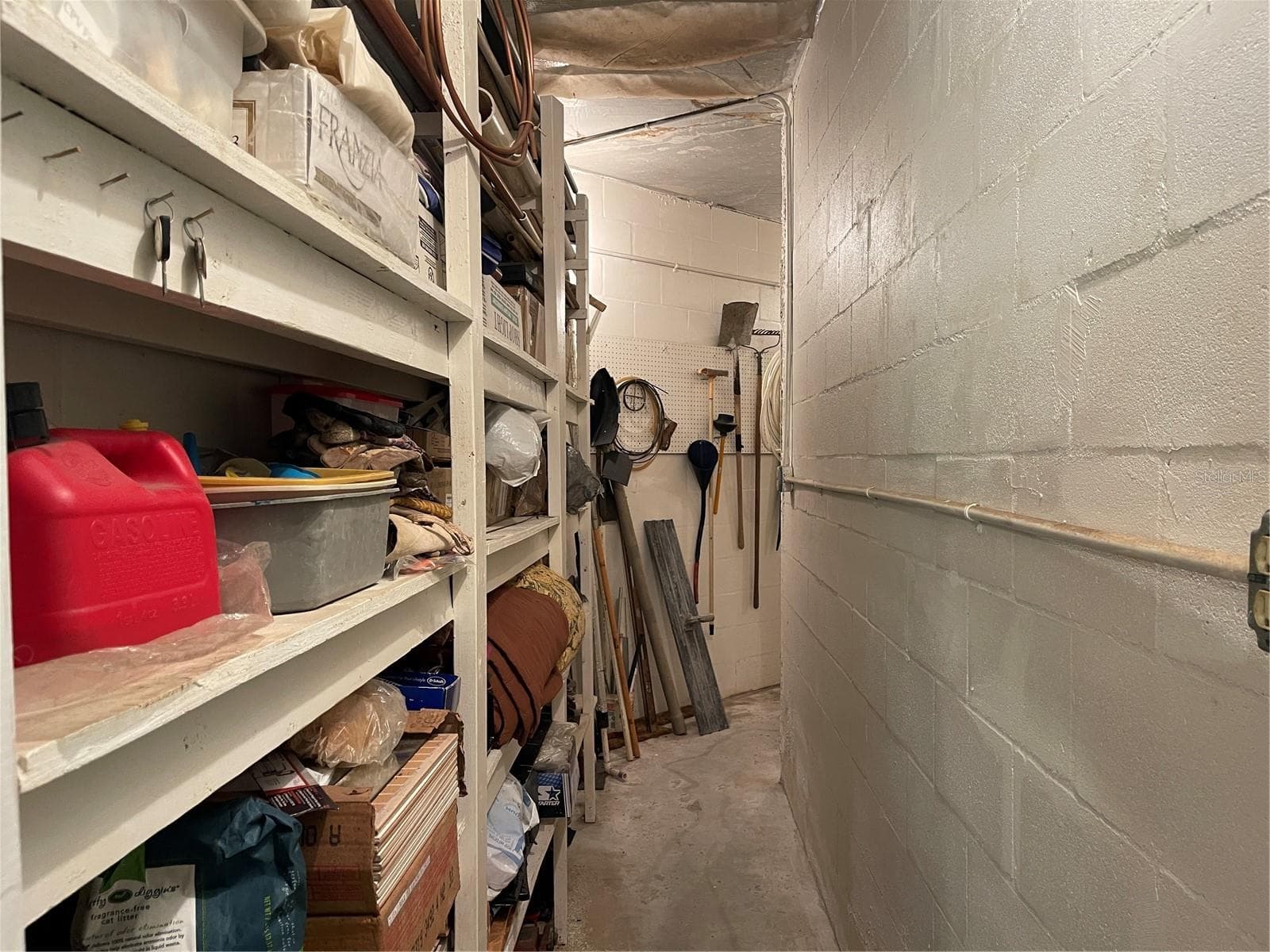 This utility room on the first floor is approximately 289 sq ft. - 5422 CYRIL DR, DADE CITY