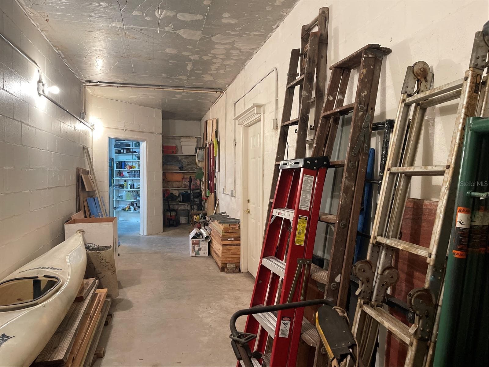 Utility storage room is approximately 324 sq ft - 5422 CYRIL DR, DADE CITY