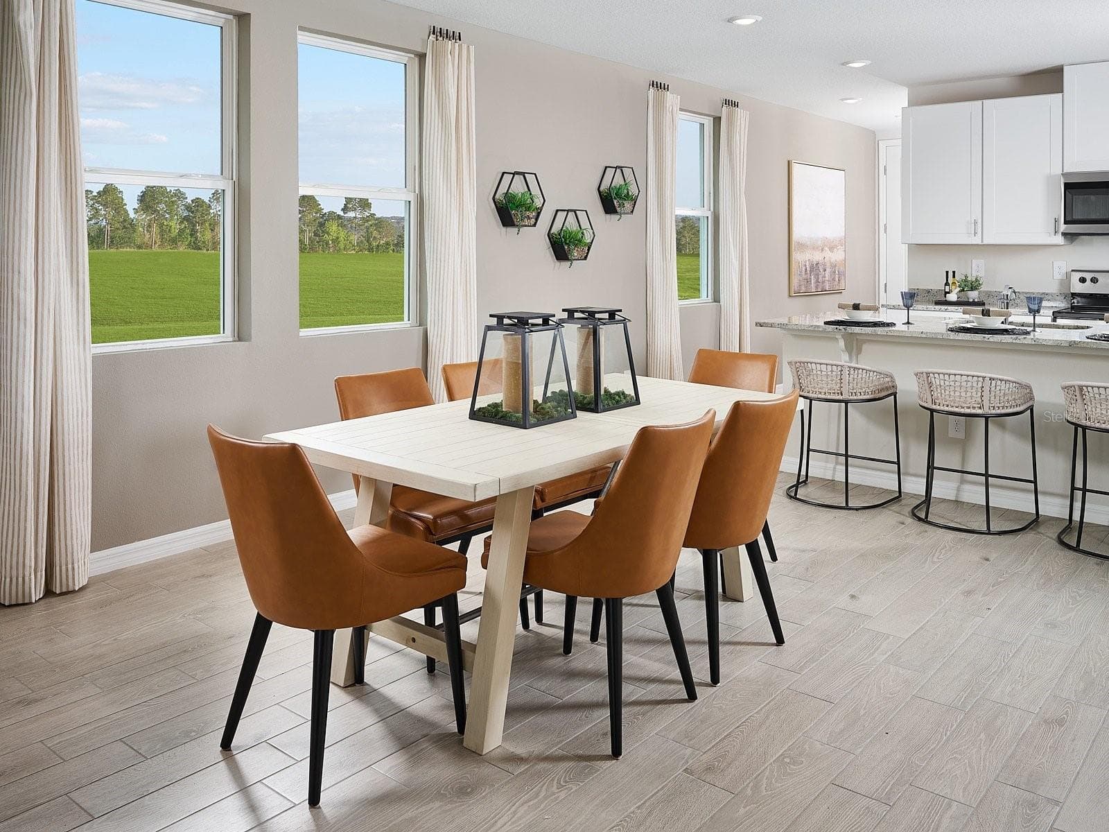 Photo is not of the actual home, but is an inspirational photo of builder’s model home and may depict options, furnishings, and/or decorator features that are not included. - 116 CANOE BEND AVE, NOKOMIS