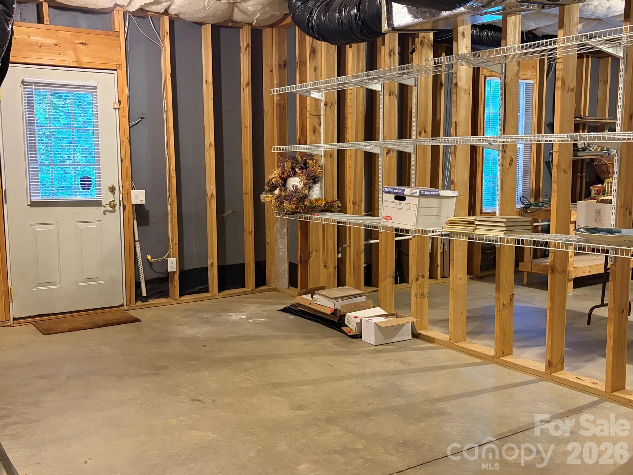 Unfinished basement: framed, plumbing and electrical rough-in - 11437 Corliss Avenue, Charlotte
