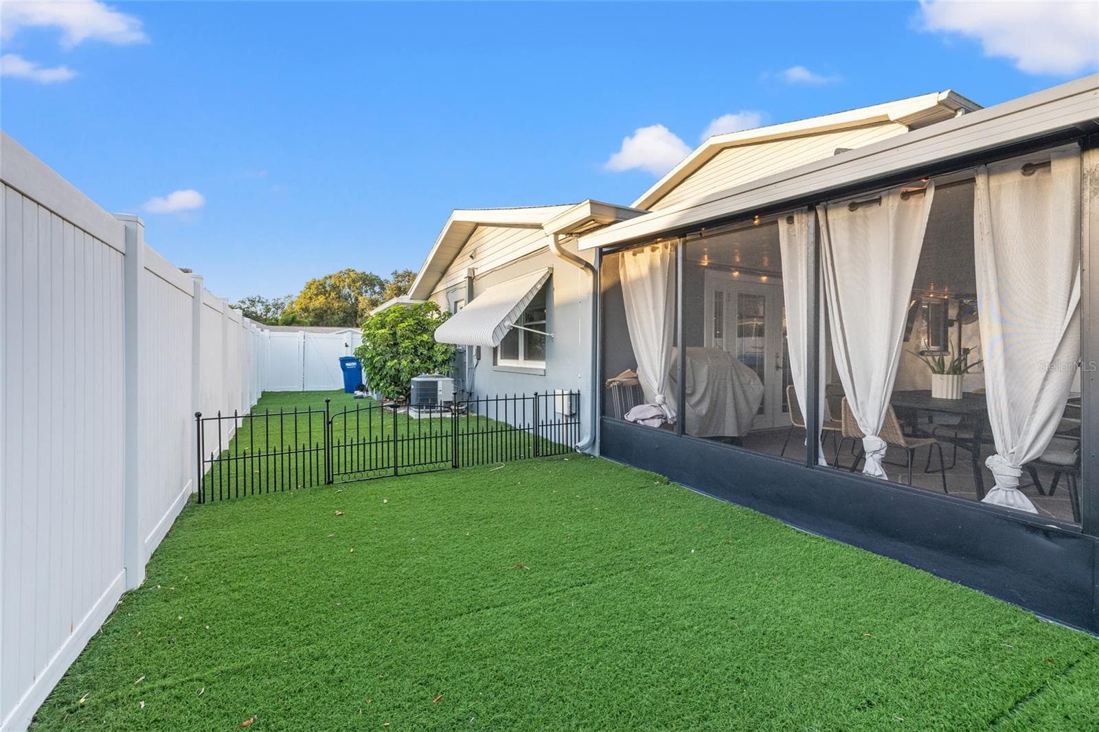 Backyard with Artificial Turf - 9270 119TH AVE, LARGO