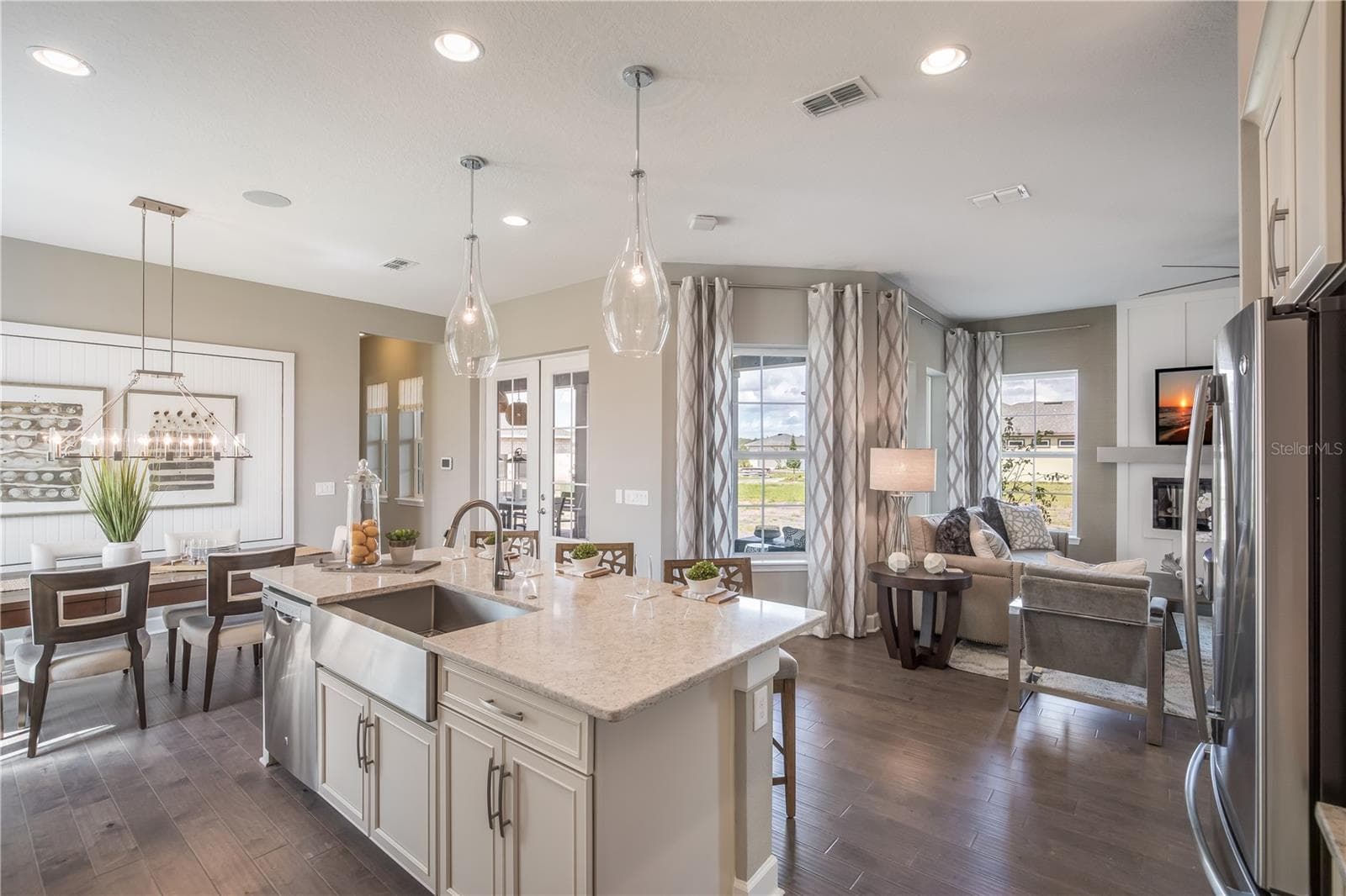 The sample photos included are of the model home and are meant to showcase the craftsmanship and design quality. - 9520 FLOREY WAY, ORLANDO