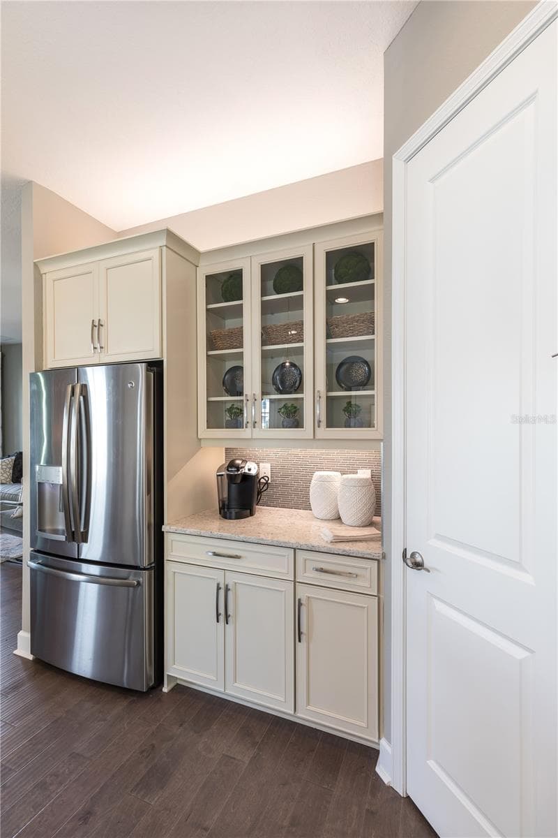 The sample photos included are of the model home and are meant to showcase the craftsmanship and design quality. - 9520 FLOREY WAY, ORLANDO