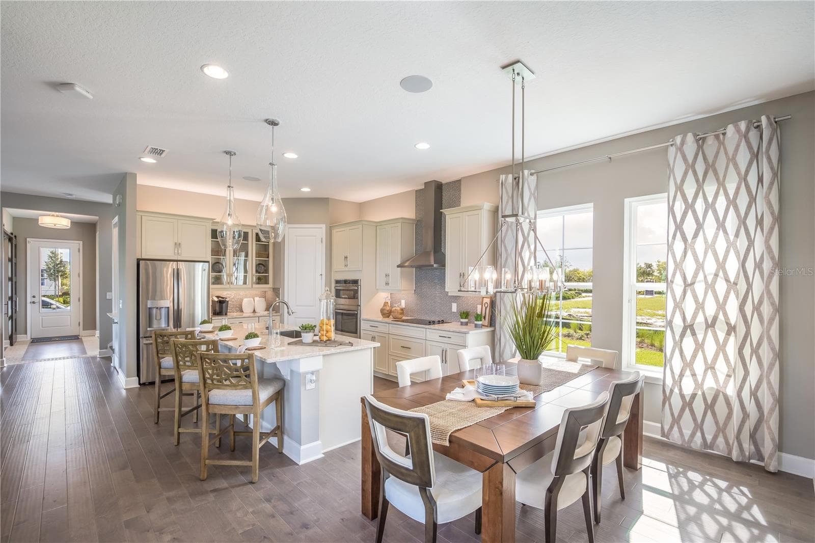 The sample photos included are of the model home and are meant to showcase the craftsmanship and design quality. - 9520 FLOREY WAY, ORLANDO