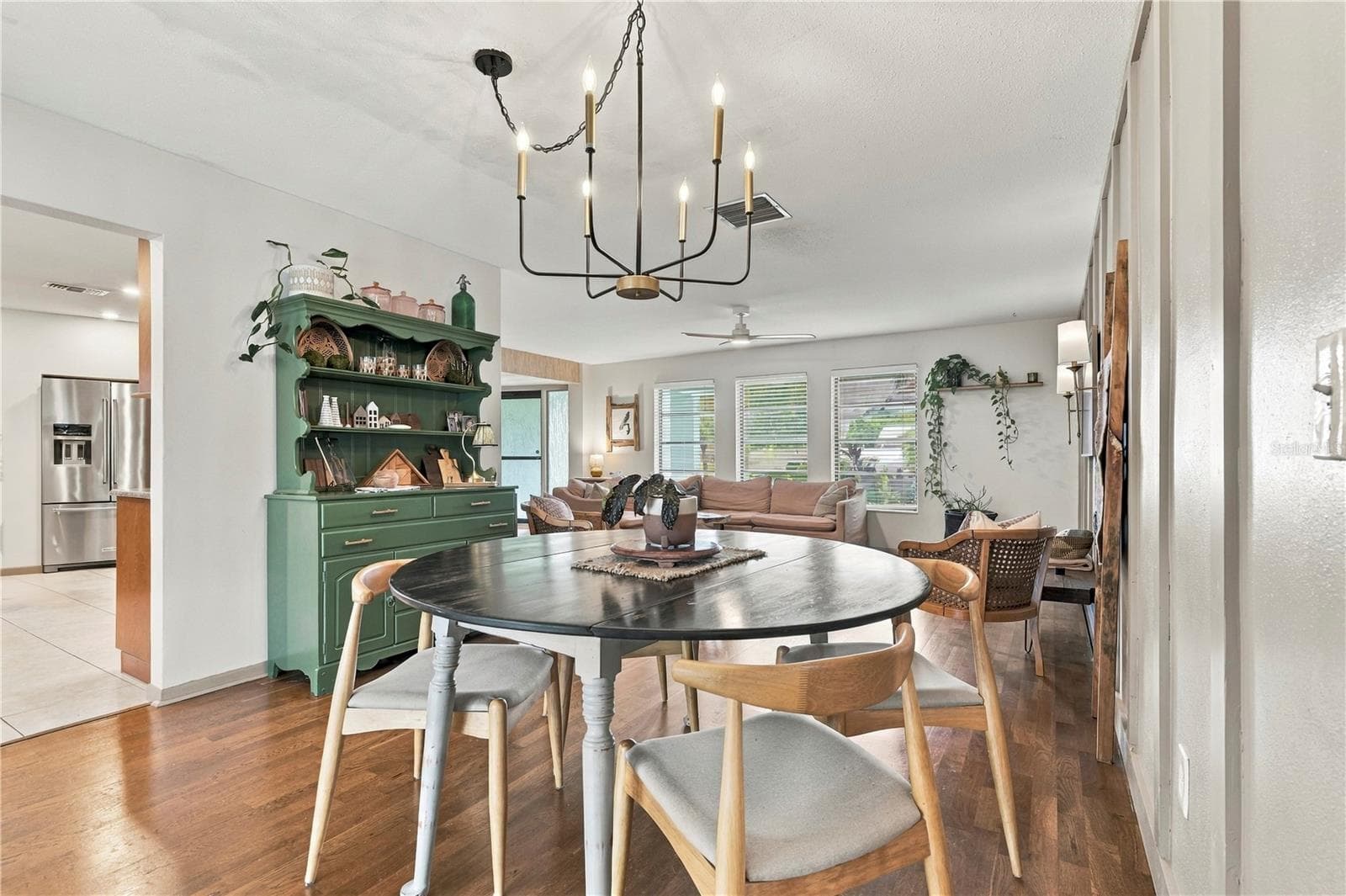 Dining room looking into living space and kitchen entry - 10211 139TH ST, LARGO