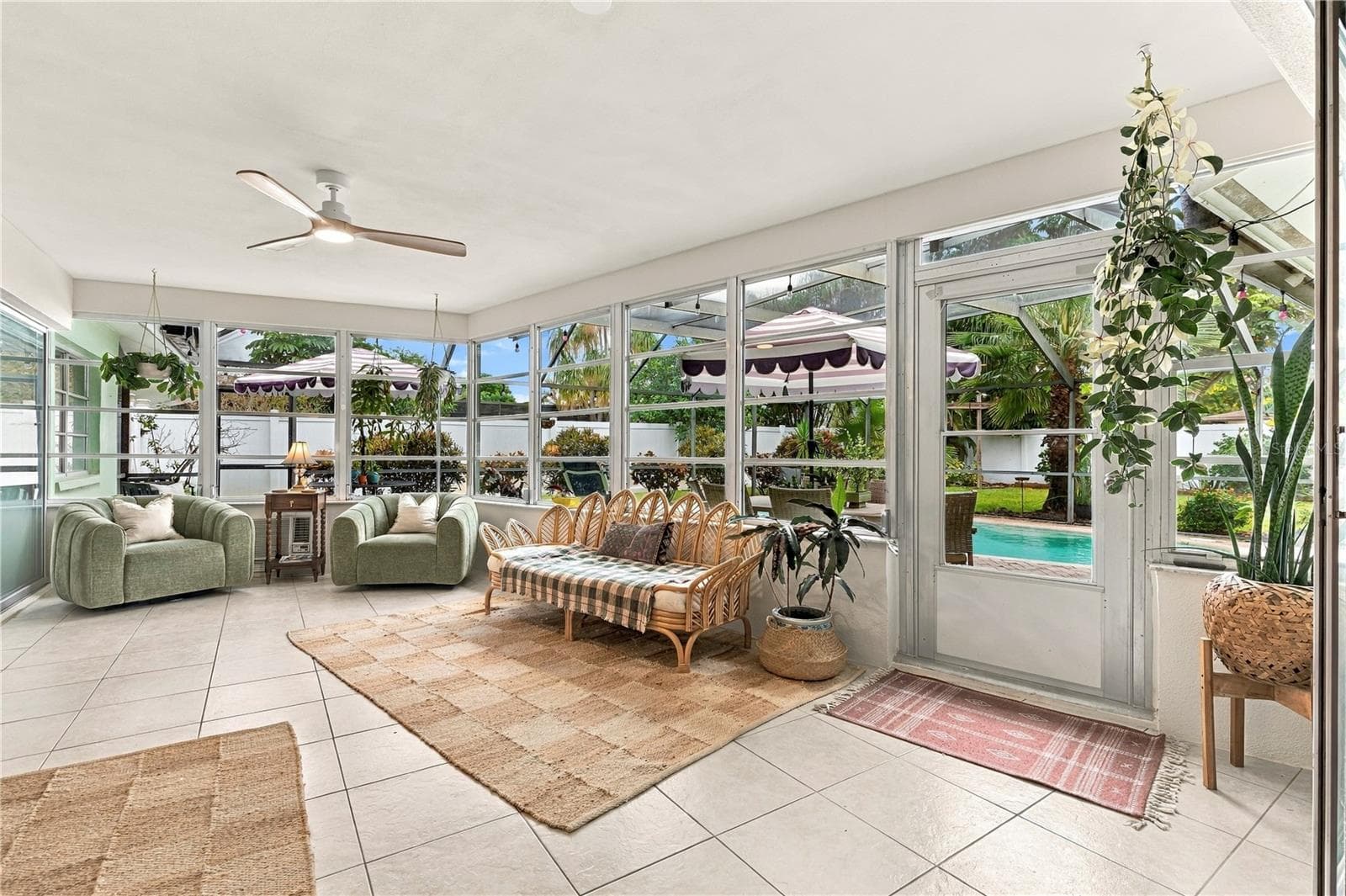 Sun room door to screened pool space - 10211 139TH ST, LARGO