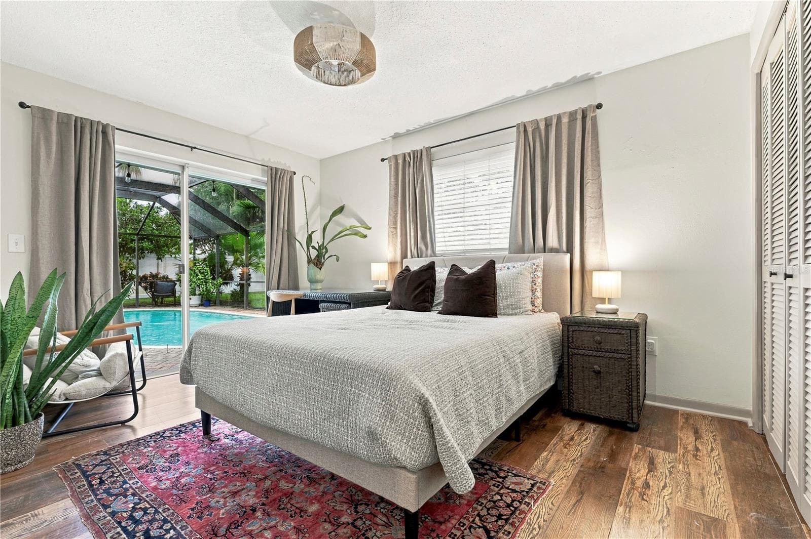 Bedroom 4 with pool patio access - 10211 139TH ST, LARGO