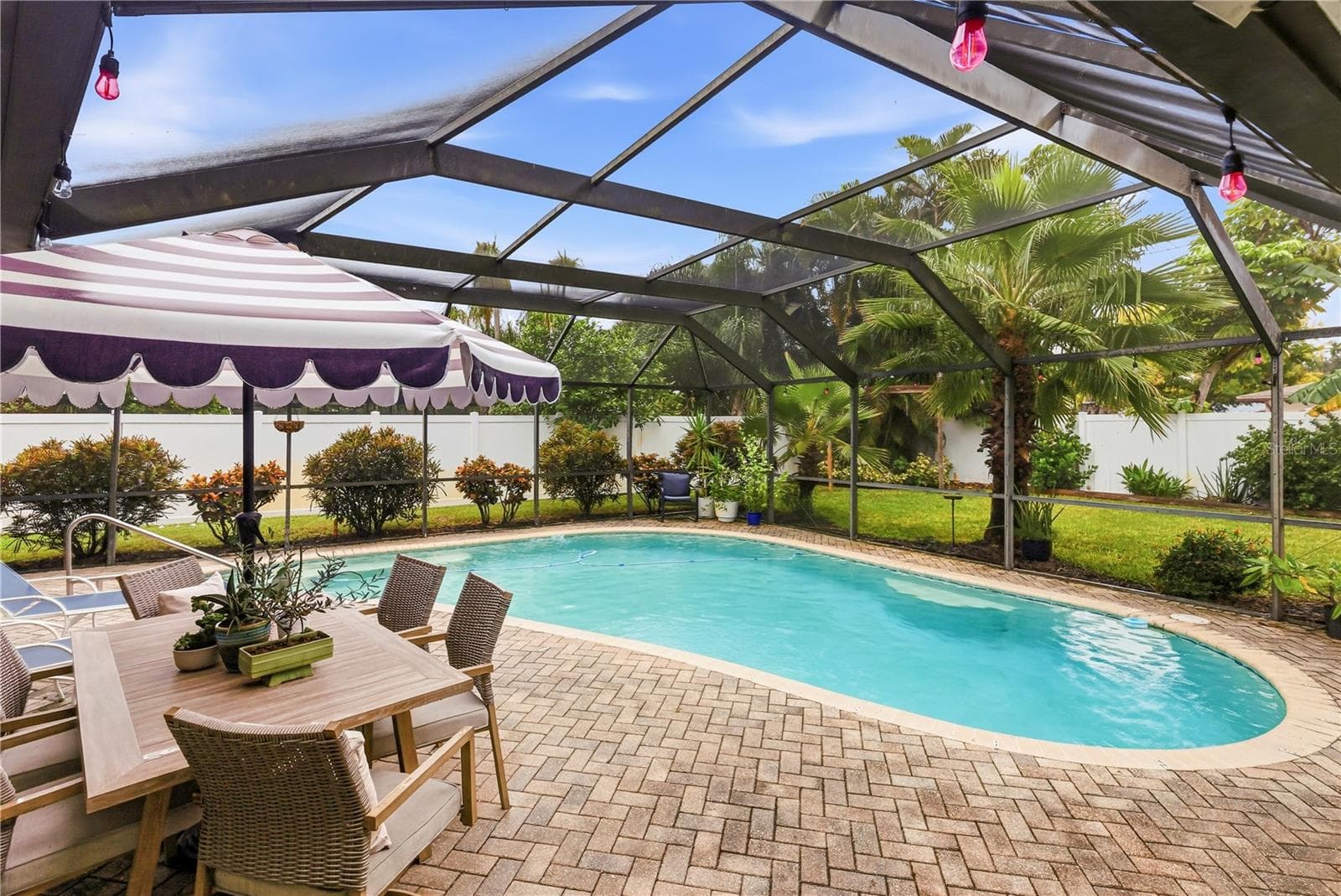 Pool view from sun room doorway - 10211 139TH ST, LARGO