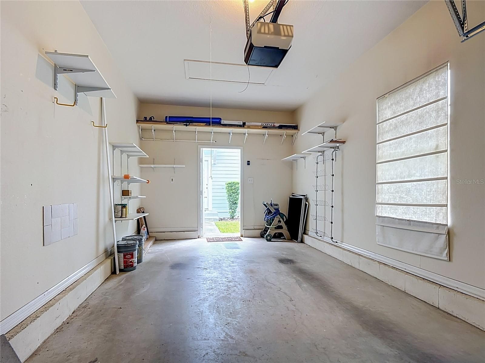 Garage with Shelving - 1003 OLD BLUSH RD, CELEBRATION