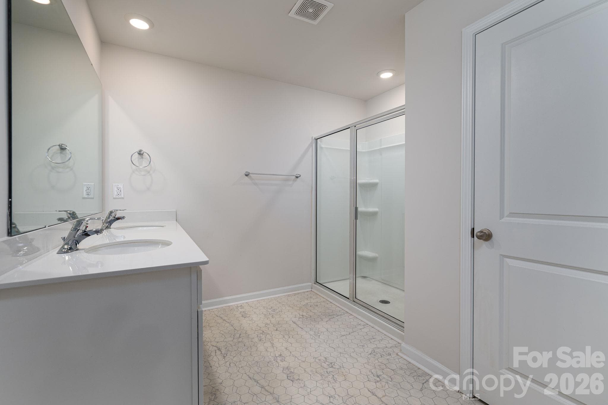Primary Bathroom with double sink and separate toilet area - 1021 Foxberry Lane, Maiden