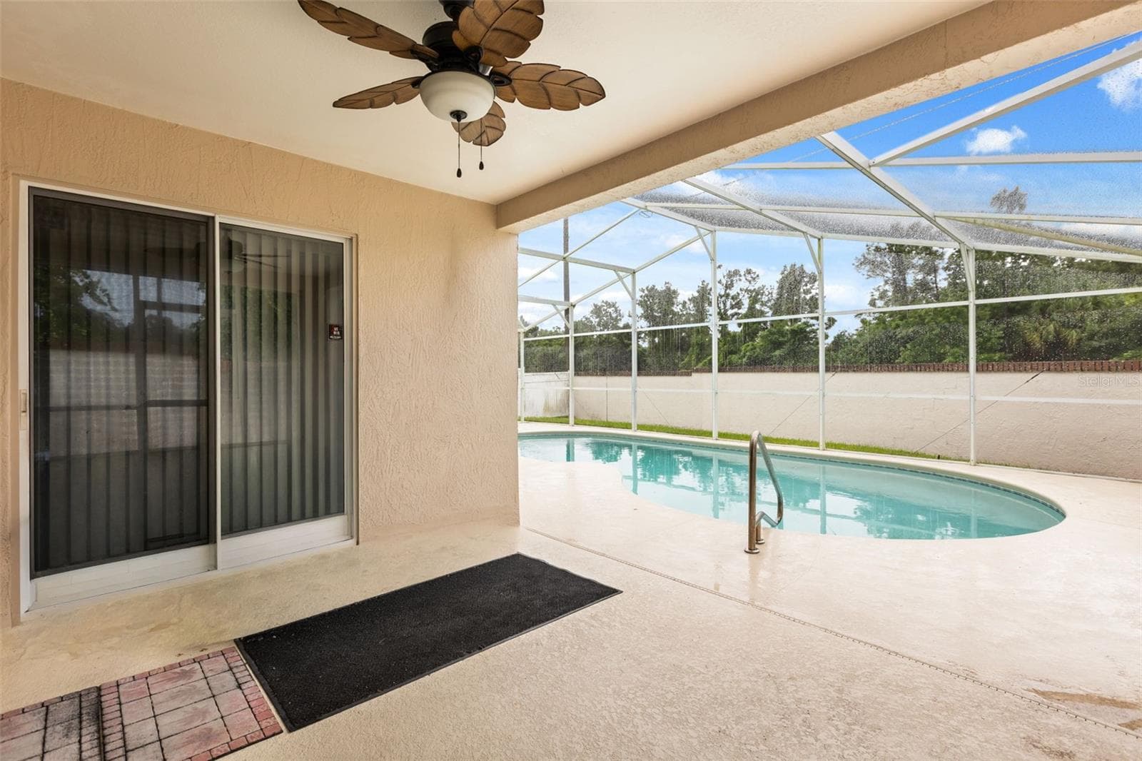 Covered lanai for your grill and outdoor furniture - 755 VIA MILANO, APOPKA