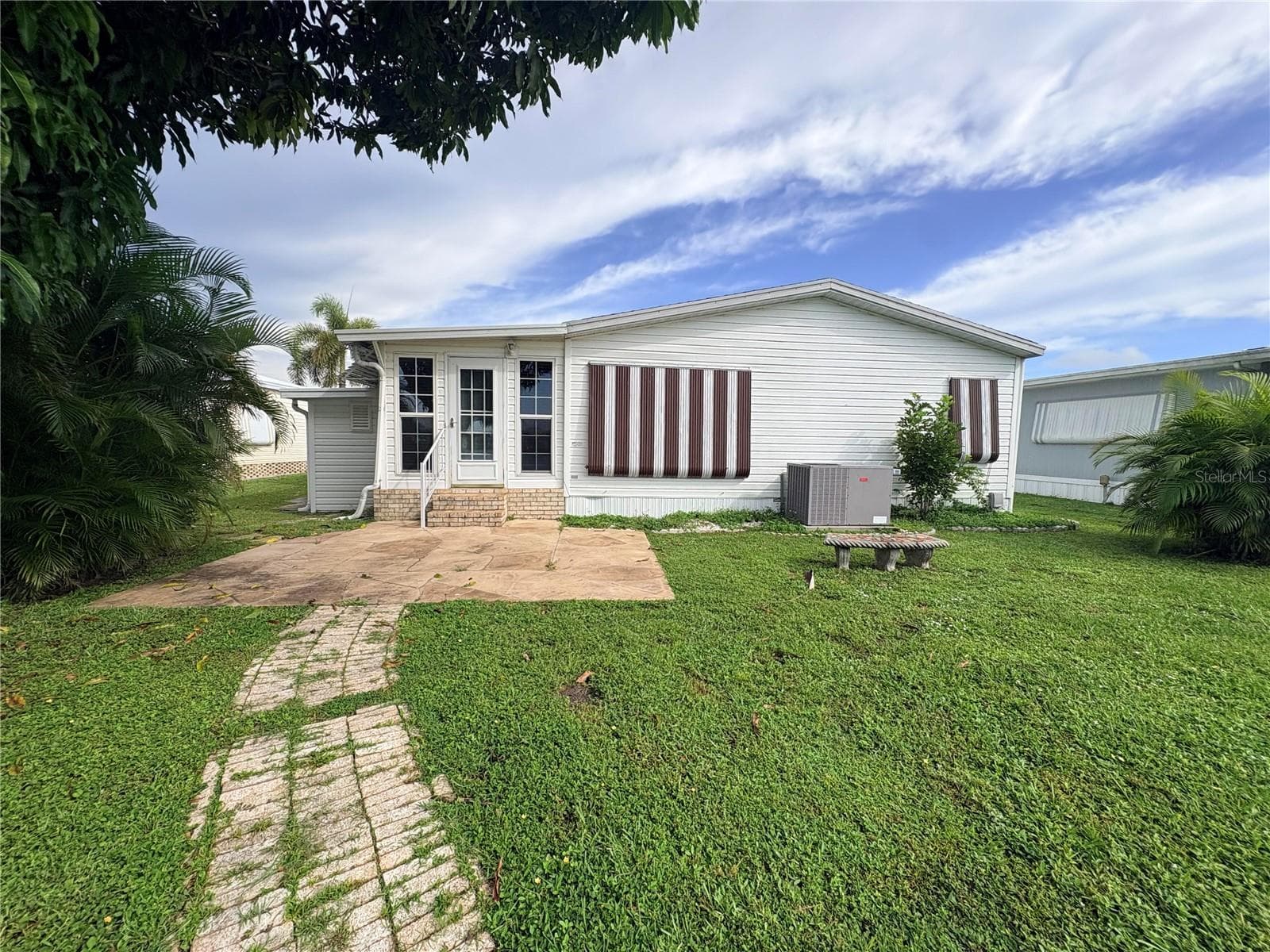 back of house - 3062 ARTESIAN LN, NORTH FORT MYERS
