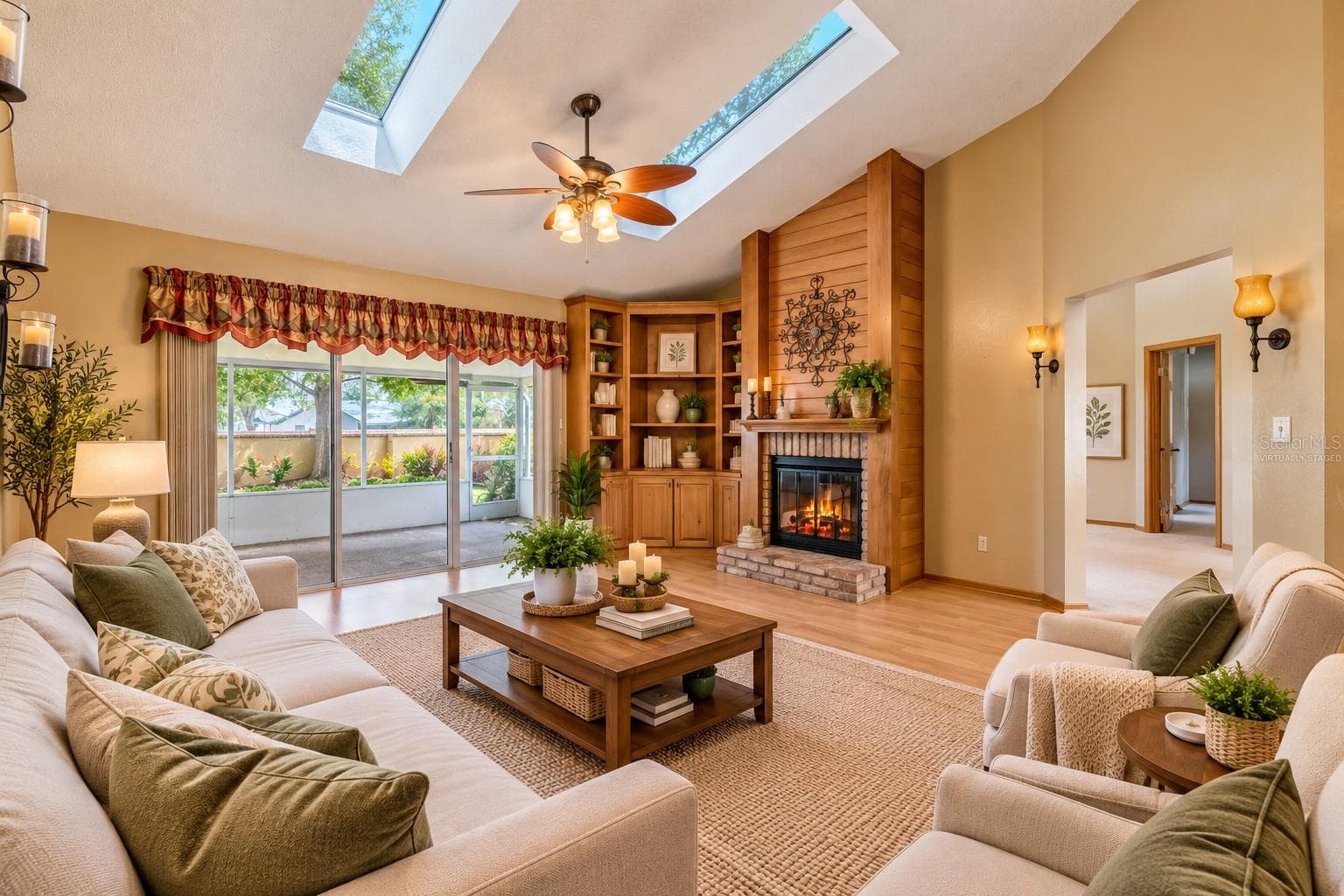 Virtually Staged Family Room With Double-Sided Fireplace - 288 RINGWOOD DR, WINTER SPRINGS