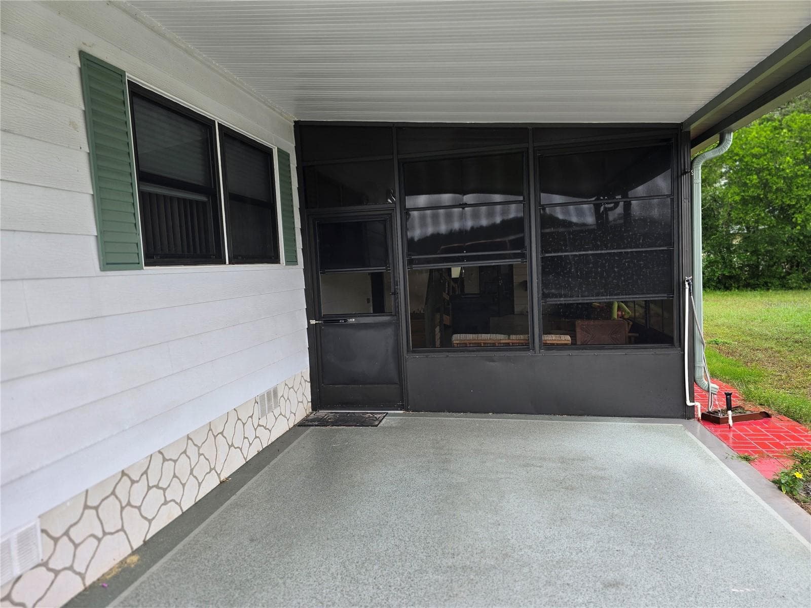 CARPORT - 16802 HARLEY ST, HUDSON