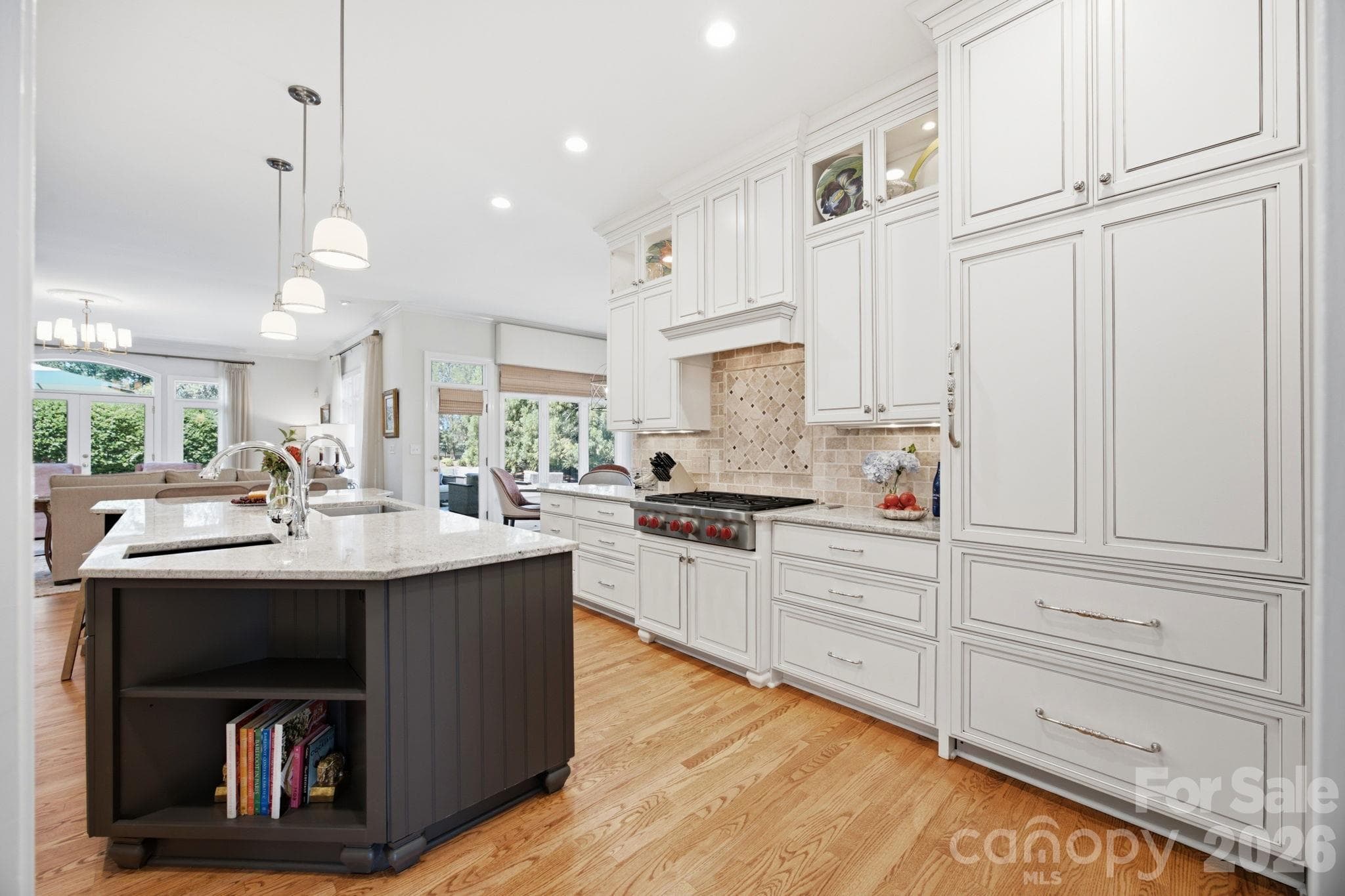 A sleek, functional kitchen shot highlighting the home's premier culinary space. - 18416 Peninsula Club Drive, Cornelius