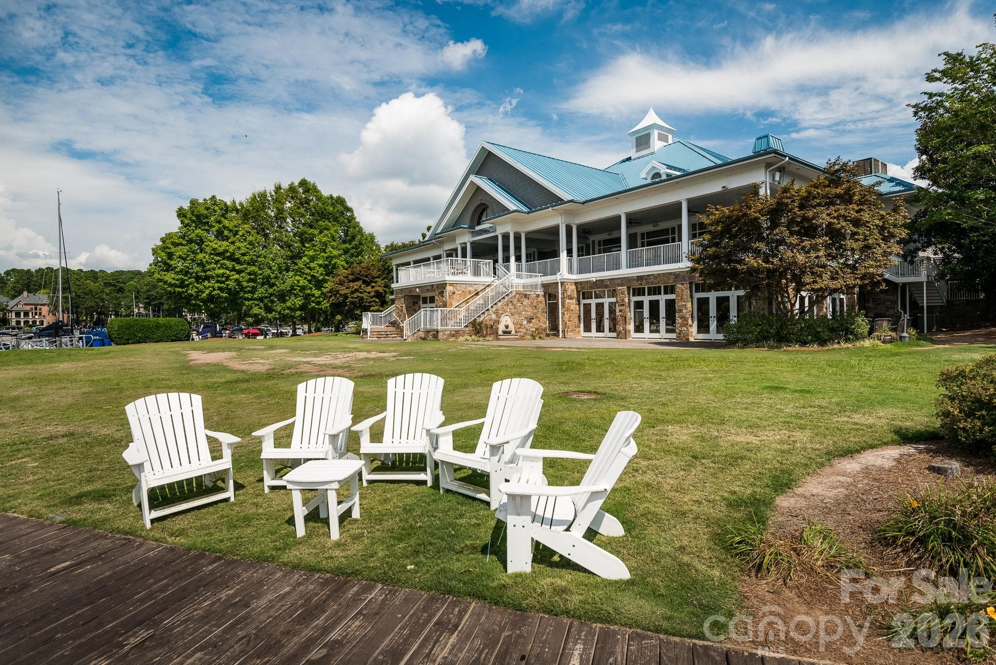 Quiet waterfront seating area designed for taking in tranquil views and sunsets. - 18416 Peninsula Club Drive, Cornelius