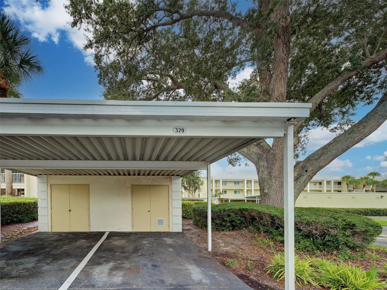 Carport parking spot with storage. - 435 CERROMAR LN #329, VENICE