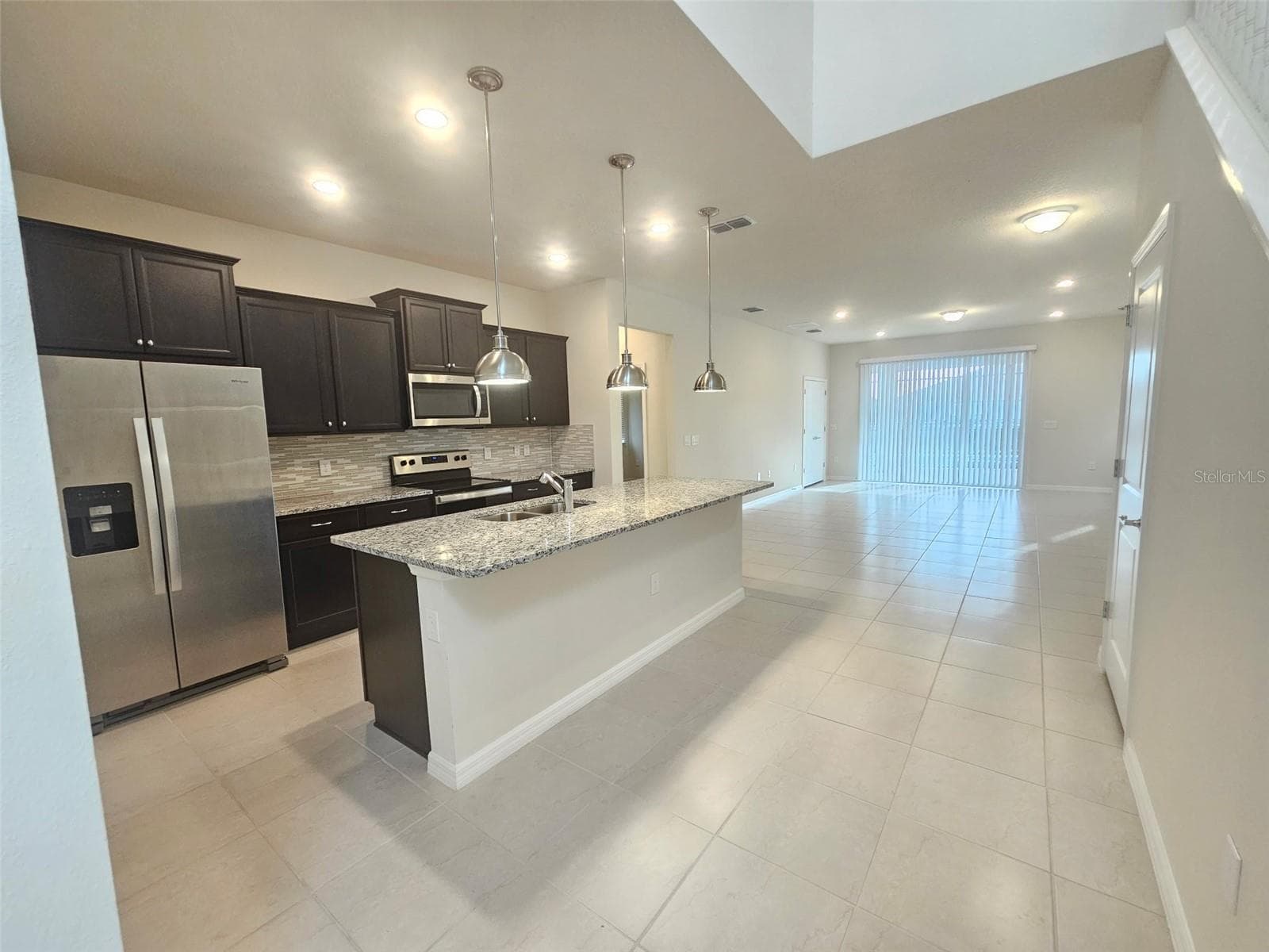 Kitchen, Dining Room and Living Room Combo - 3273 LILAC WAY, DAVENPORT