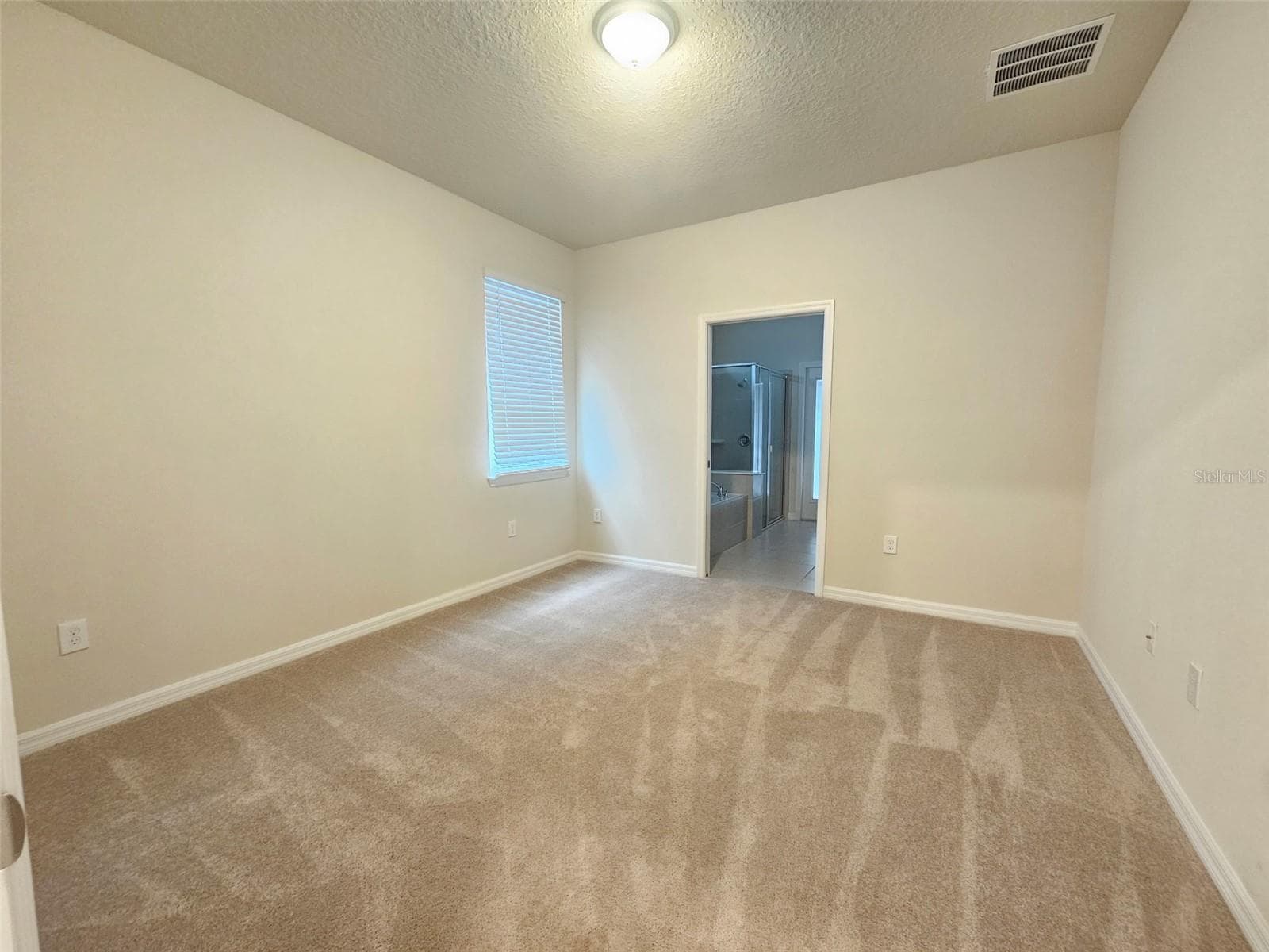 Primary Bedroom on main floor - 3273 LILAC WAY, DAVENPORT