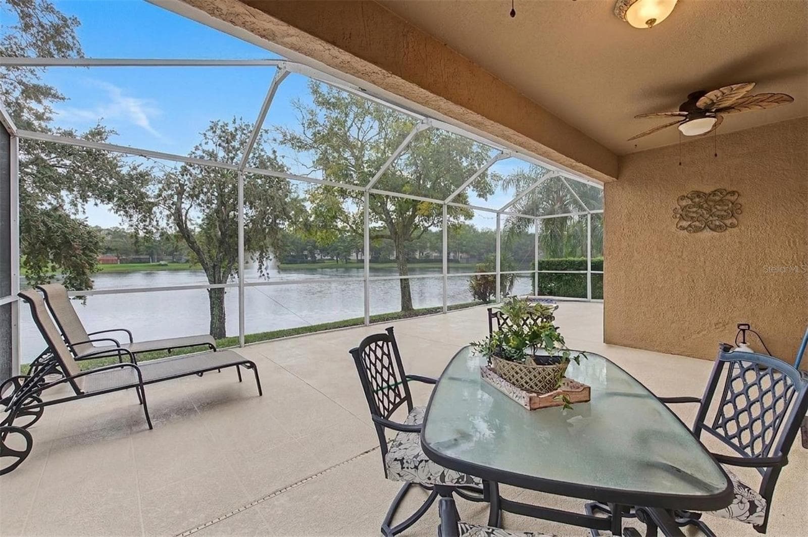 Plenty of covered space to add in your tables and chairs for breakfast or dinner - 8417 FENWICK AVE, TAMPA