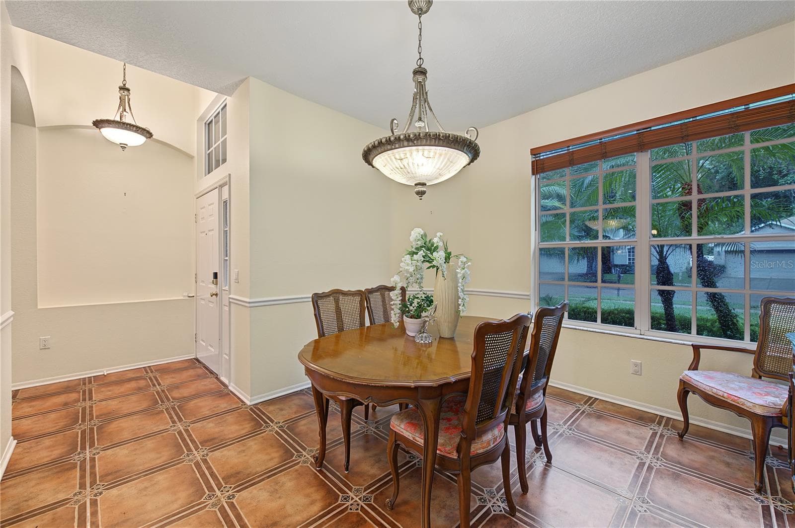 Spacious Dining Room - Tile Flooring, high ceilings - 8417 FENWICK AVE, TAMPA