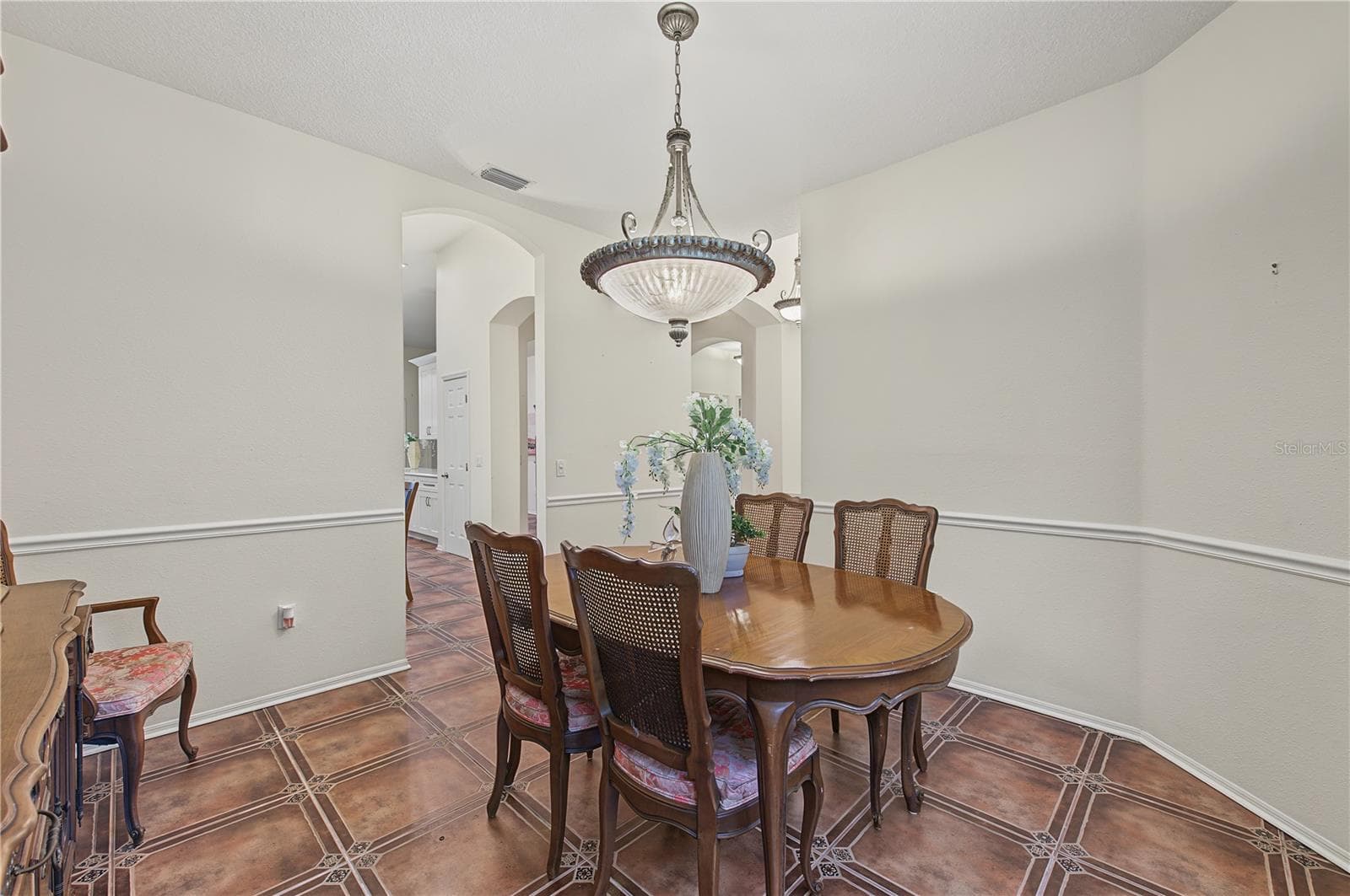 Spacious Dining Room - Tile Flooring, high ceilings - 8417 FENWICK AVE, TAMPA