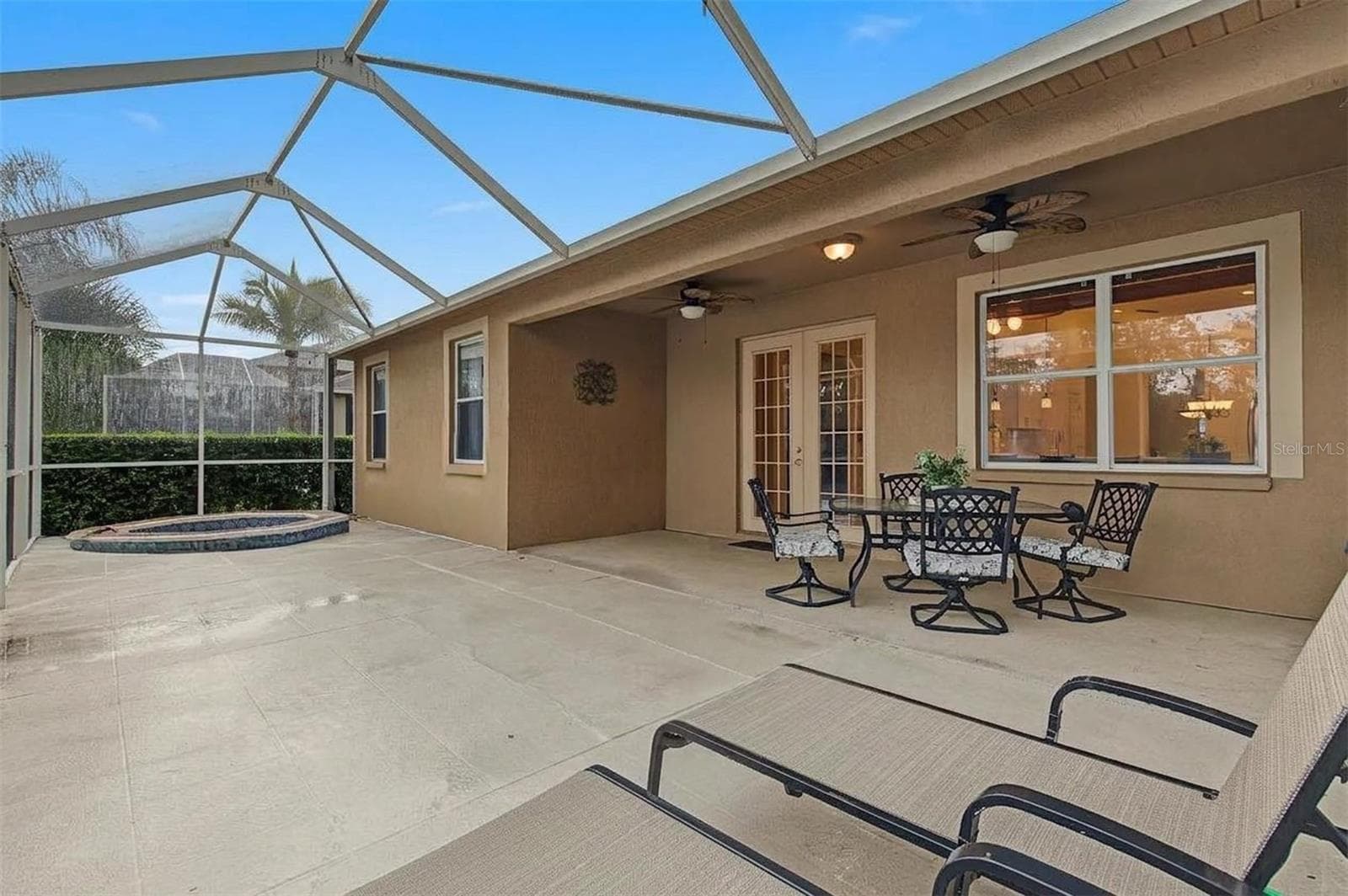 Open lanai with spa. - 8417 FENWICK AVE, TAMPA