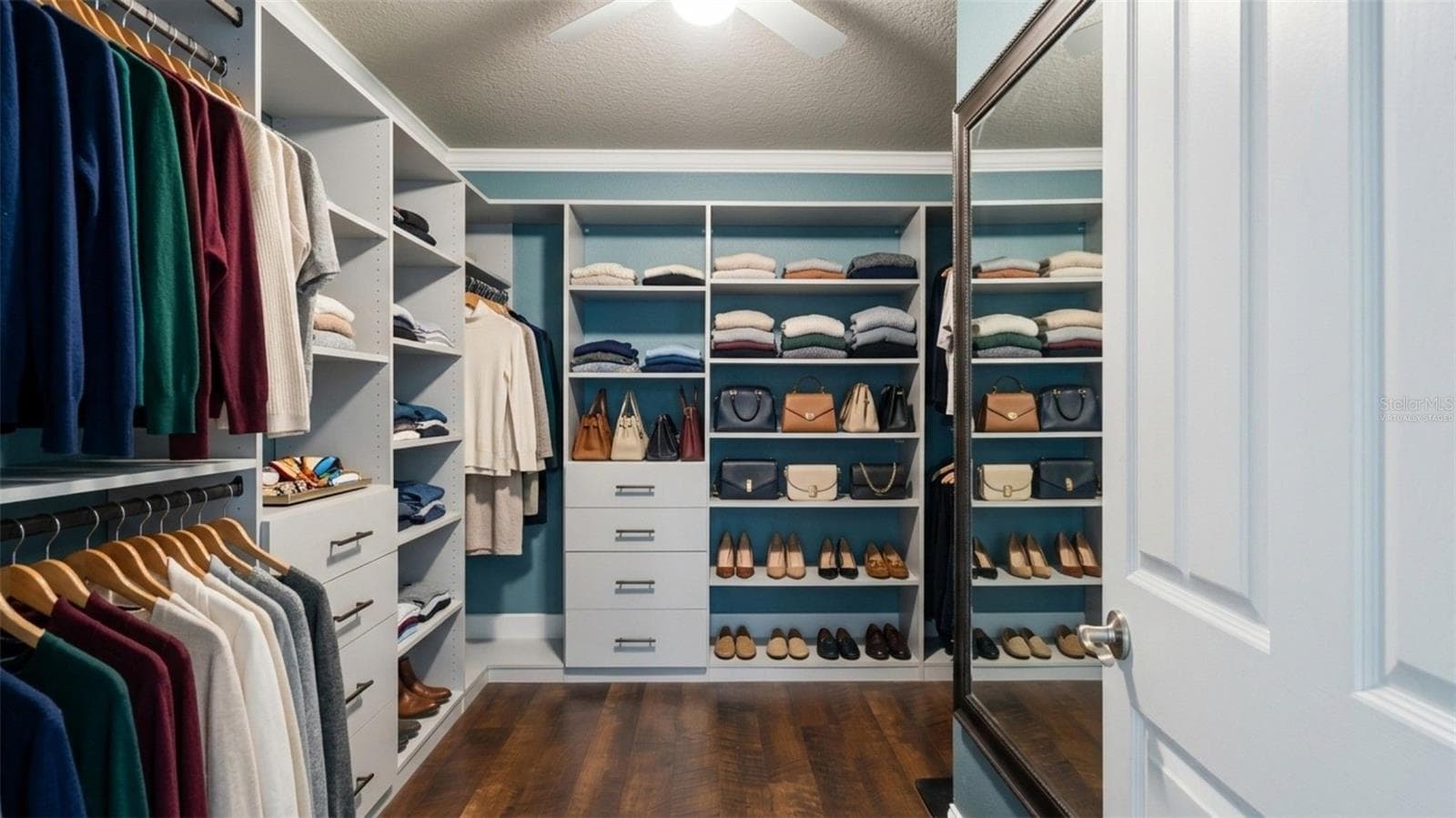 Virtually staged. Primary Walk in closet - 14825 PORTER RD, WINTER GARDEN
