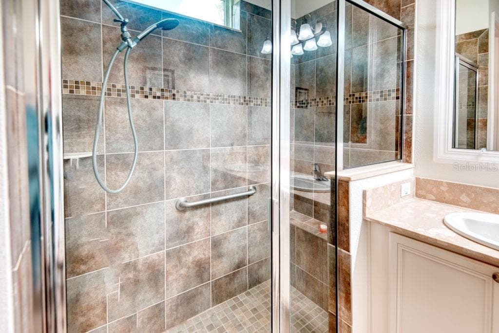 TILED Shower with Built-In Bench - 3432 FALLBROOK DR, POINCIANA