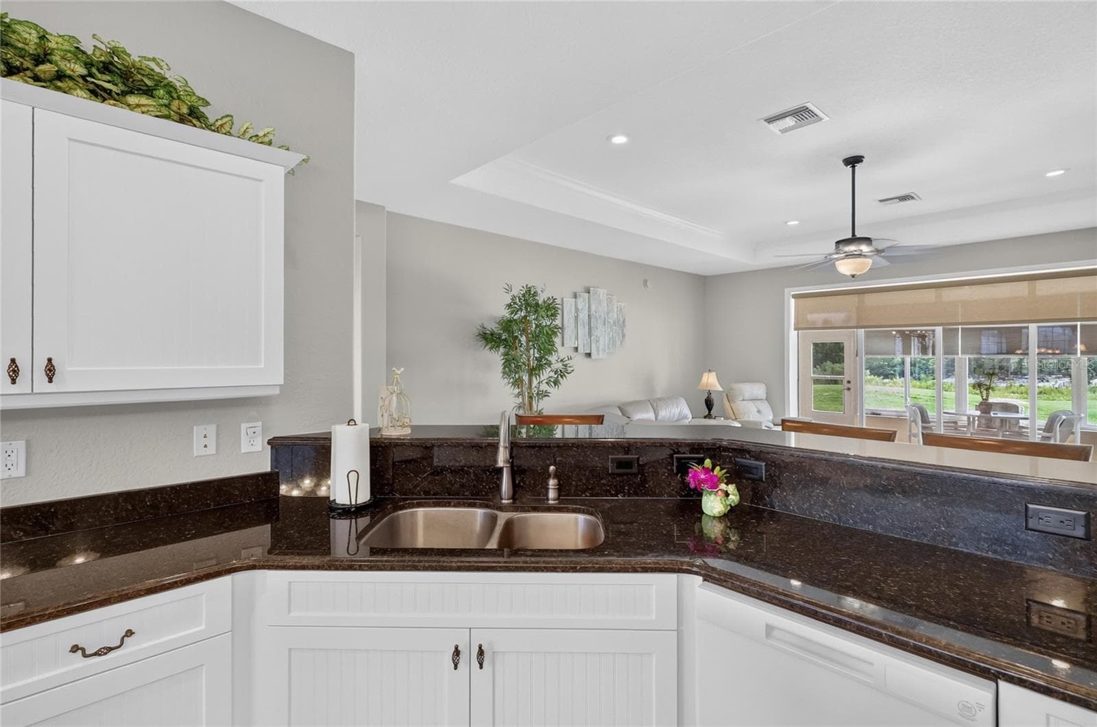 Kitchen view into Living Room - 4286 NORTH COURSE LN, AVON PARK