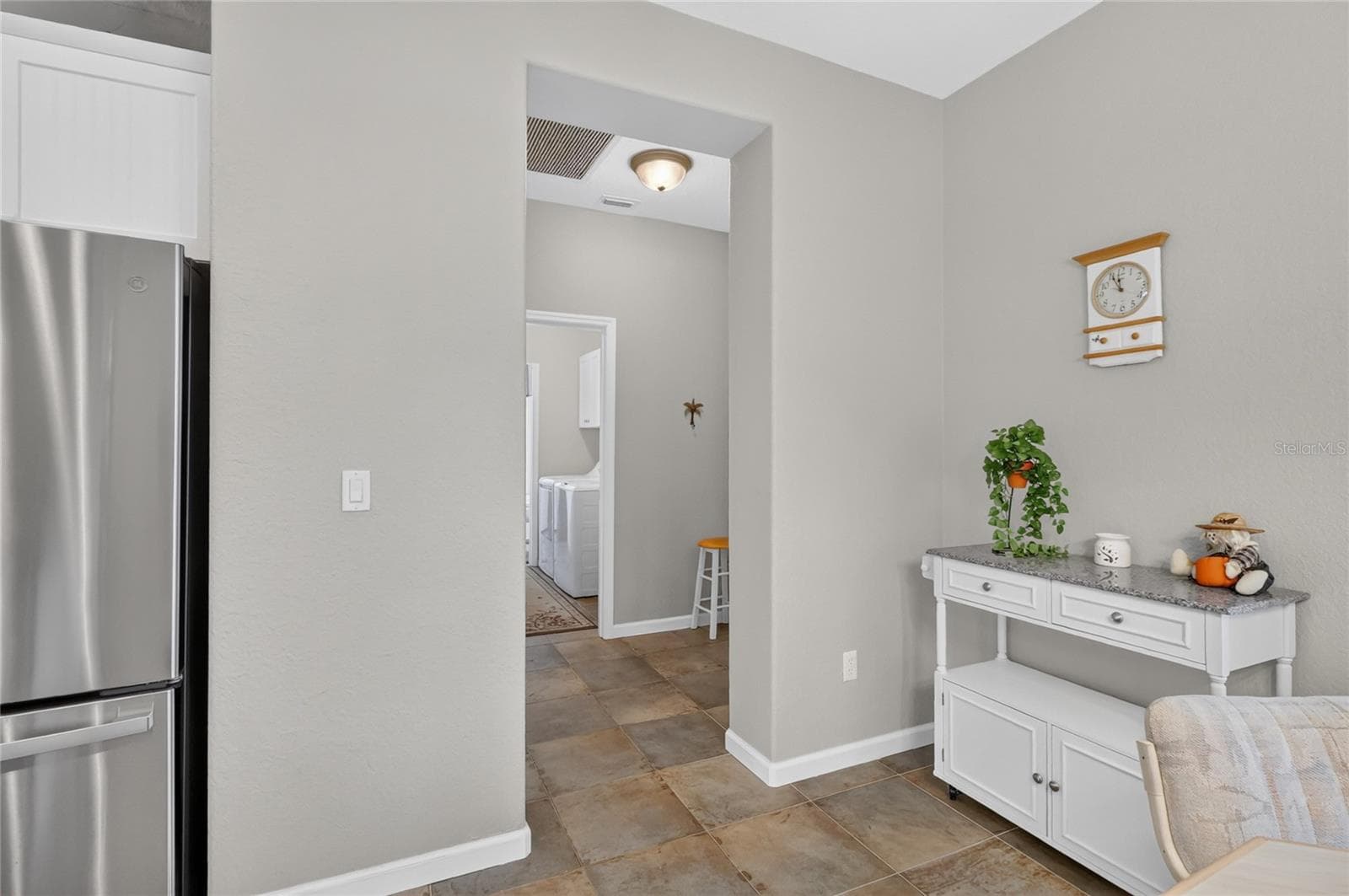 Hall to Garage and 3rd Bathroom and Laundry - 4286 NORTH COURSE LN, AVON PARK
