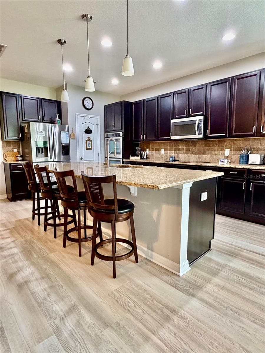 Single Family Residence at 1033 FOUNTAIN COIN LOOP, ORLANDO, photo 7 of 43