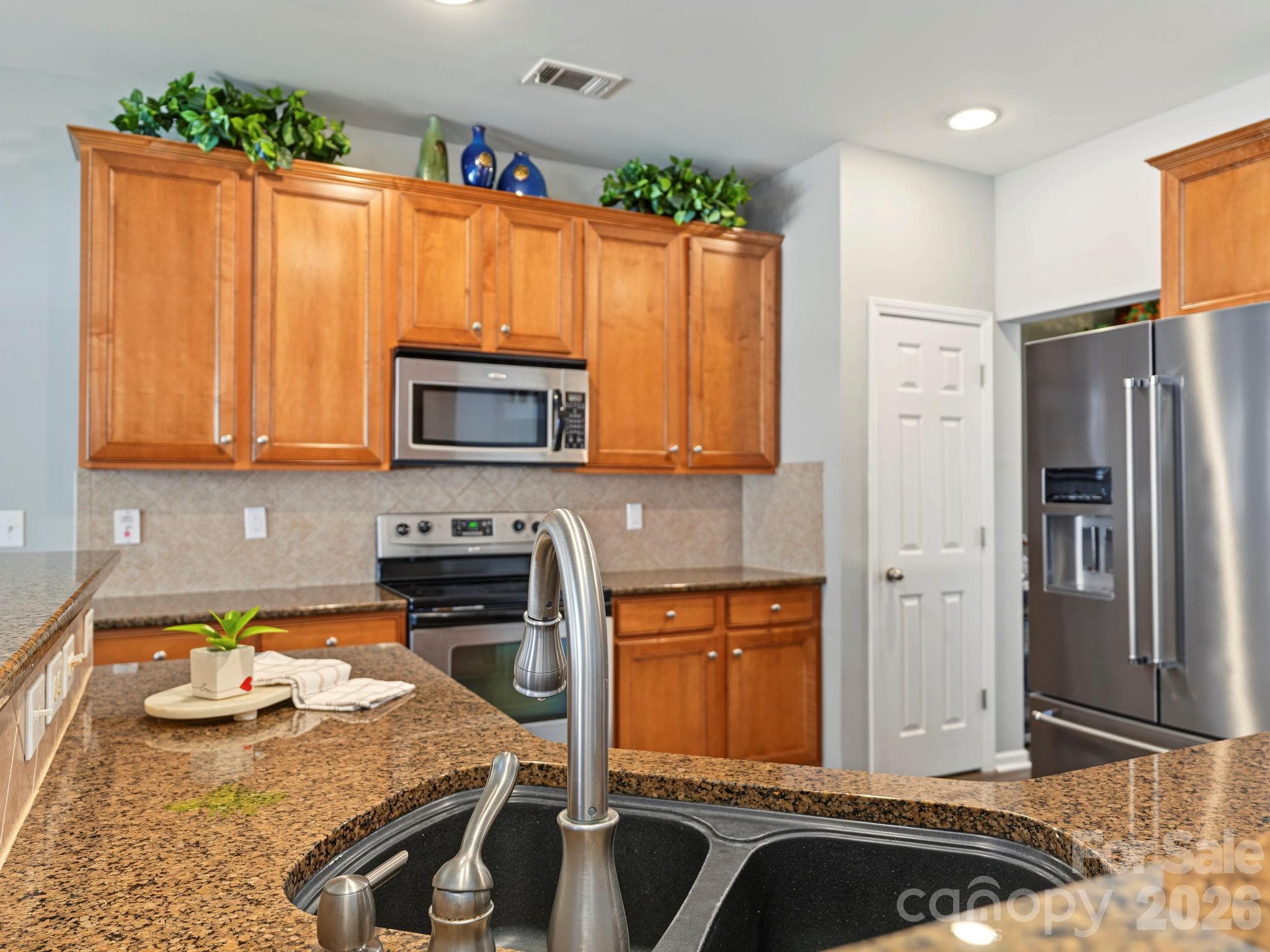 Single Family Residence at 10900 Sand River Court, Davidson, photo 9 of 45