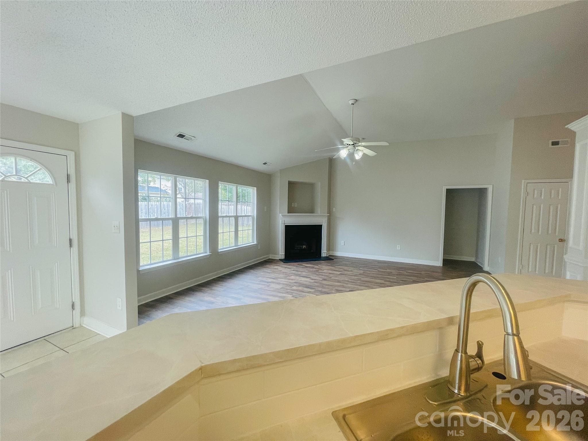 Kitchen sink to open view of family room - 1011 Cadberry Court, Indian Trail