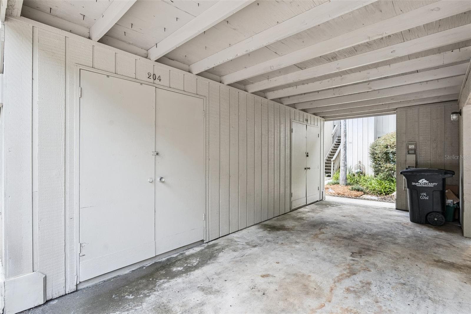 Carport with storage - 104 CROWN OAKS WAY #104, LONGWOOD