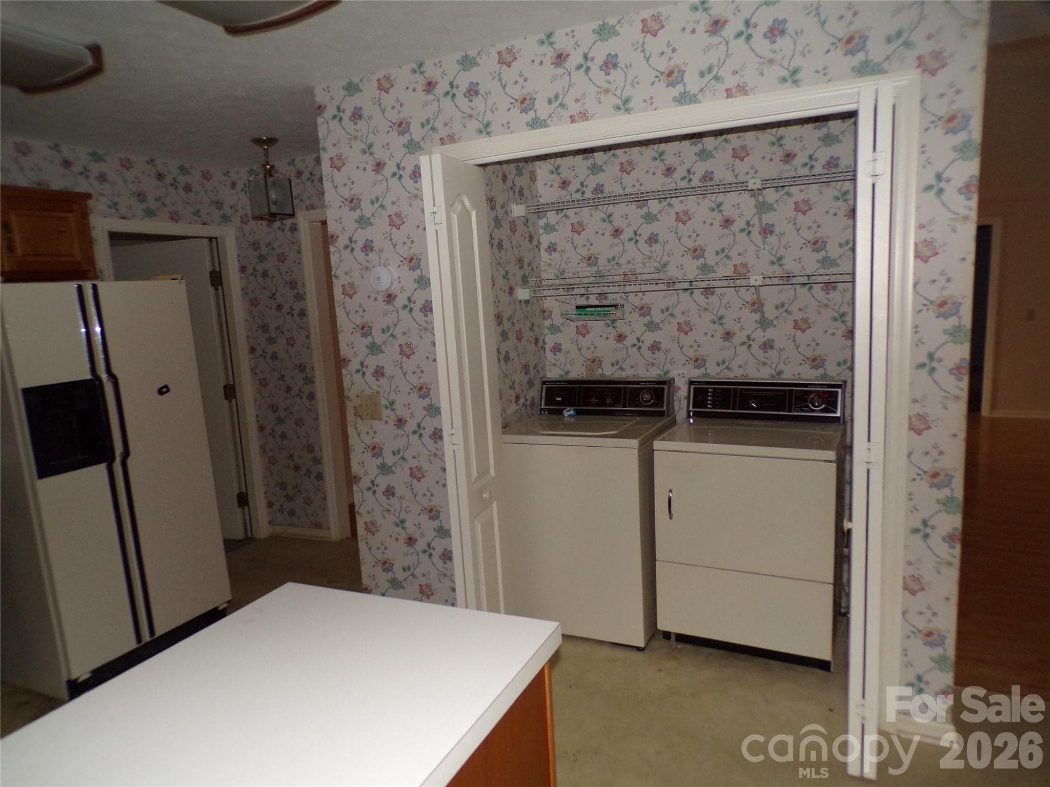 Kitchen laundry closet. - 10 Governors Drive, Hendersonville