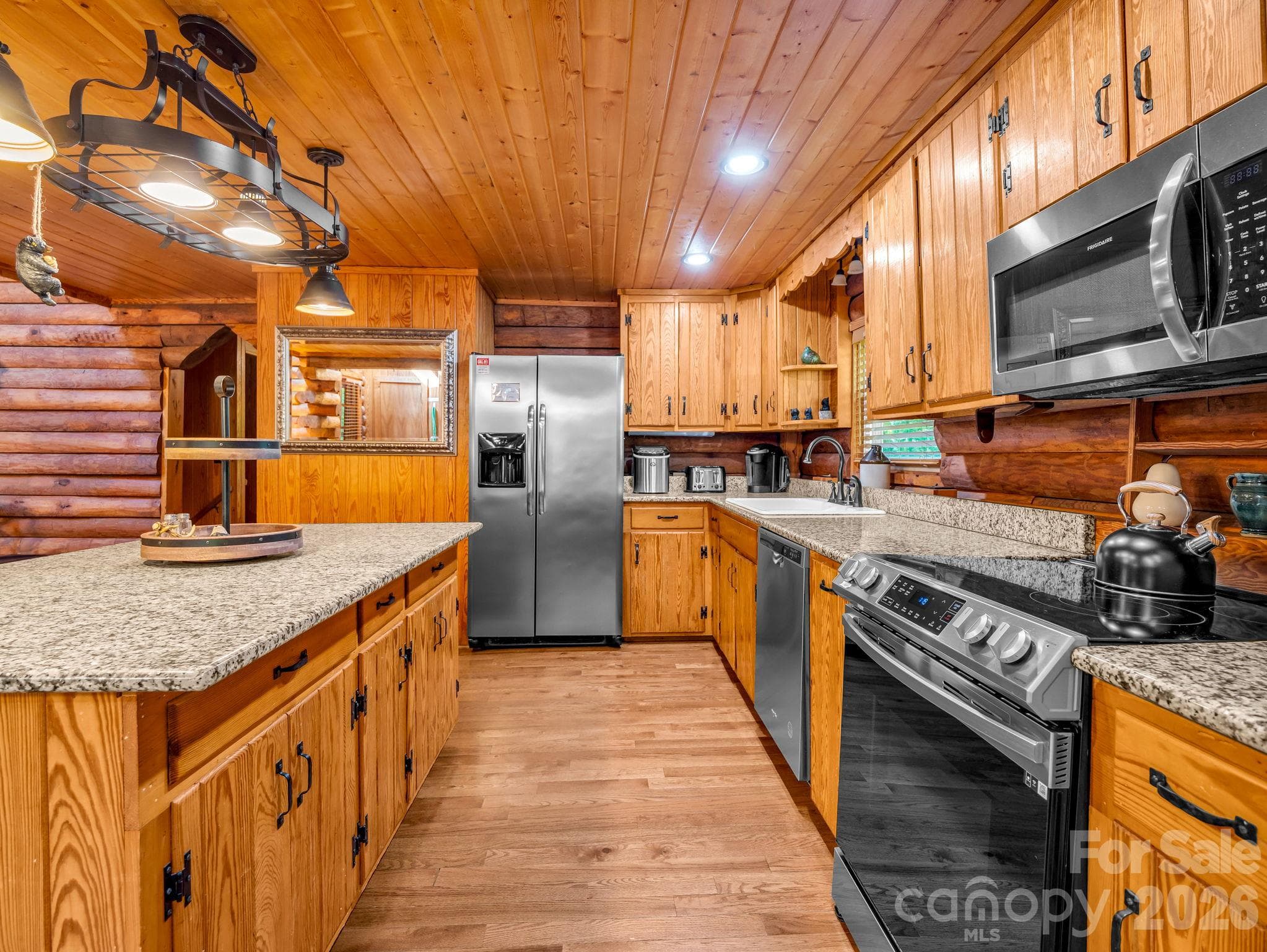 Kitchen with stainless steel and granite - 127 Cattail Road, Lake Lure