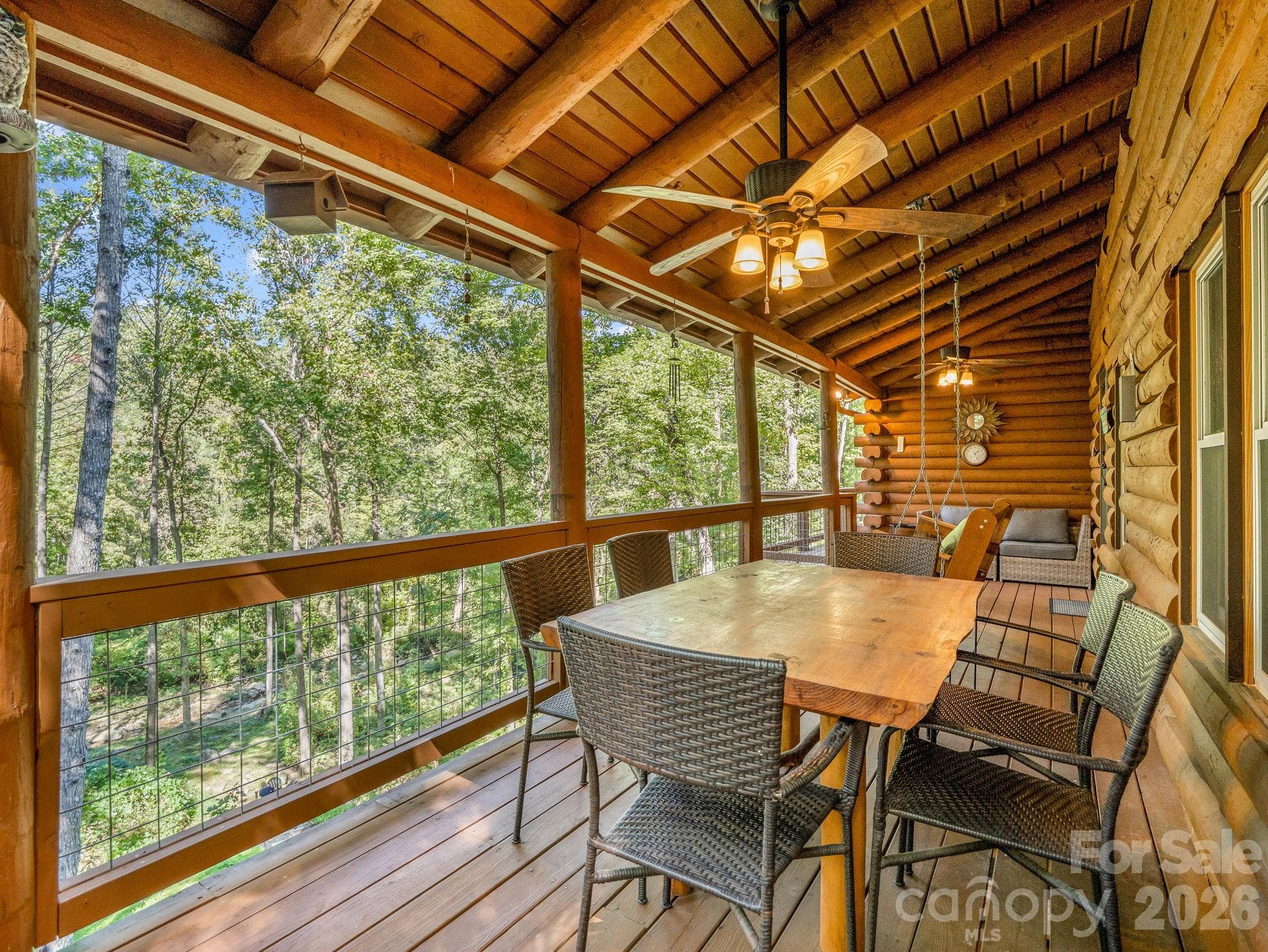 Back deck with dining area - 127 Cattail Road, Lake Lure
