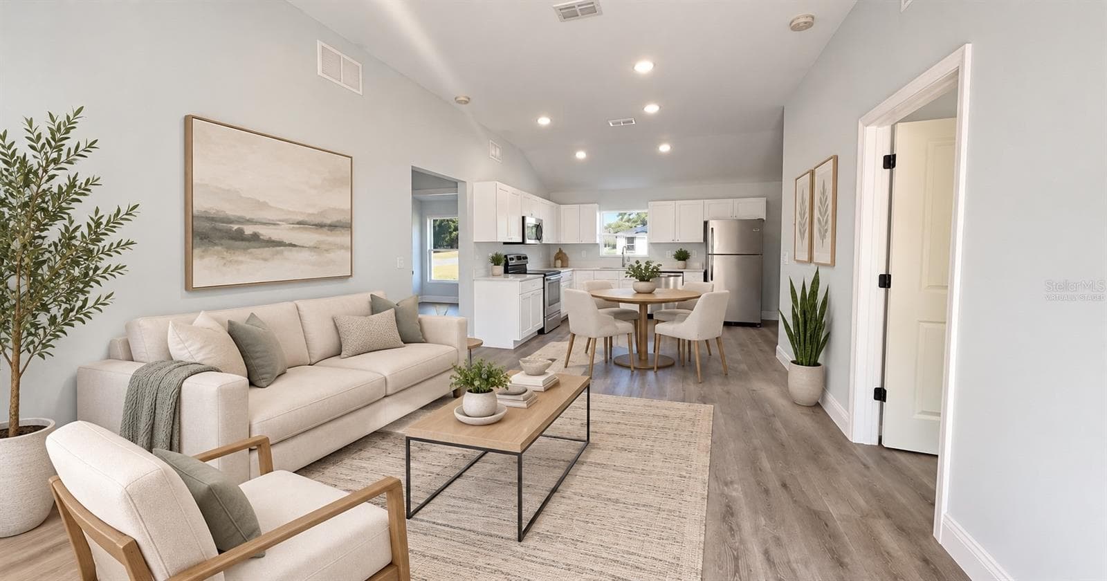 Virtually staged - modern living and dining area. - 3724 SE 130TH PL, BELLEVIEW